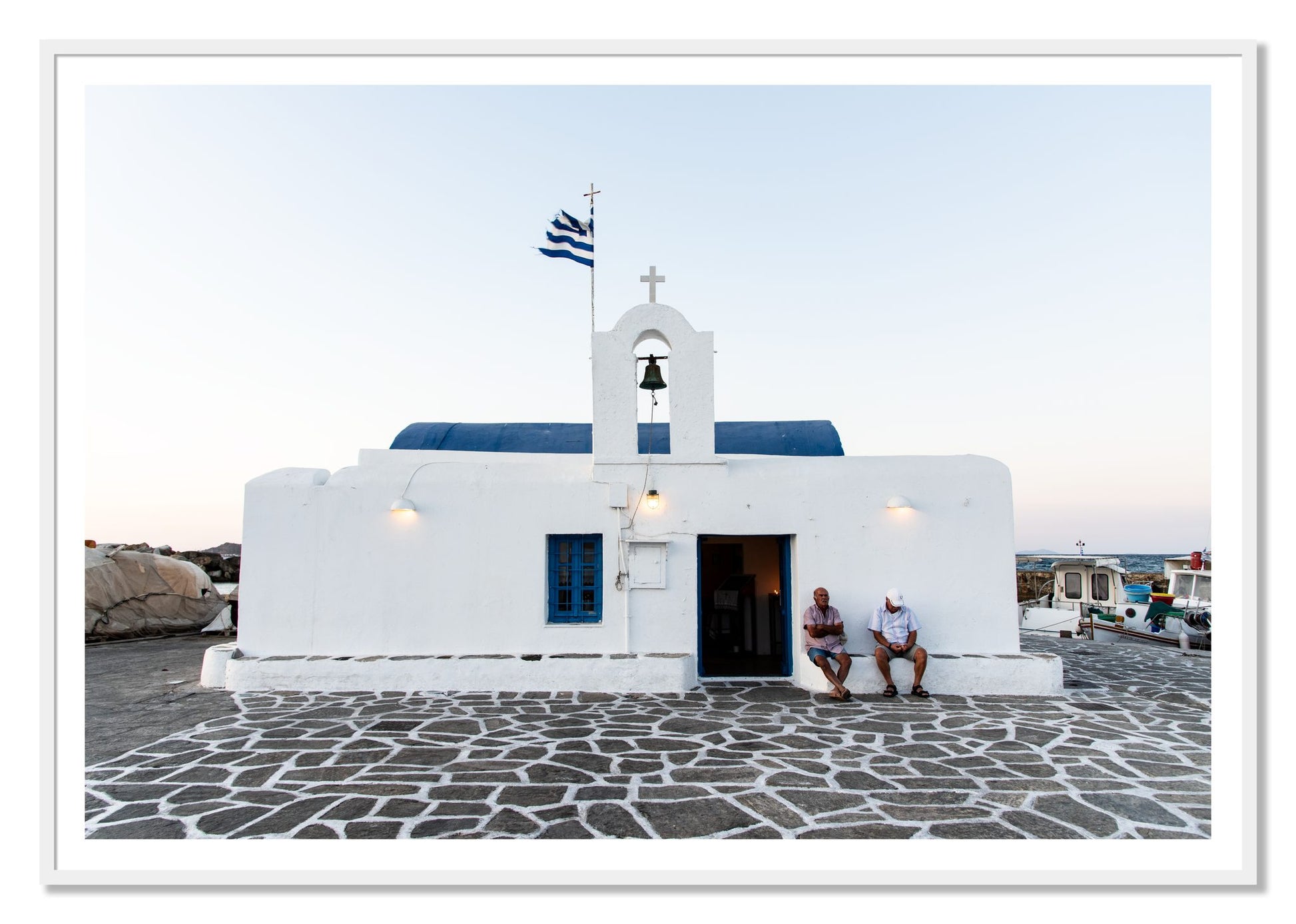 Greek Boathouse by Dylan Ozanich, 48×72 print with a White Border in a White frame