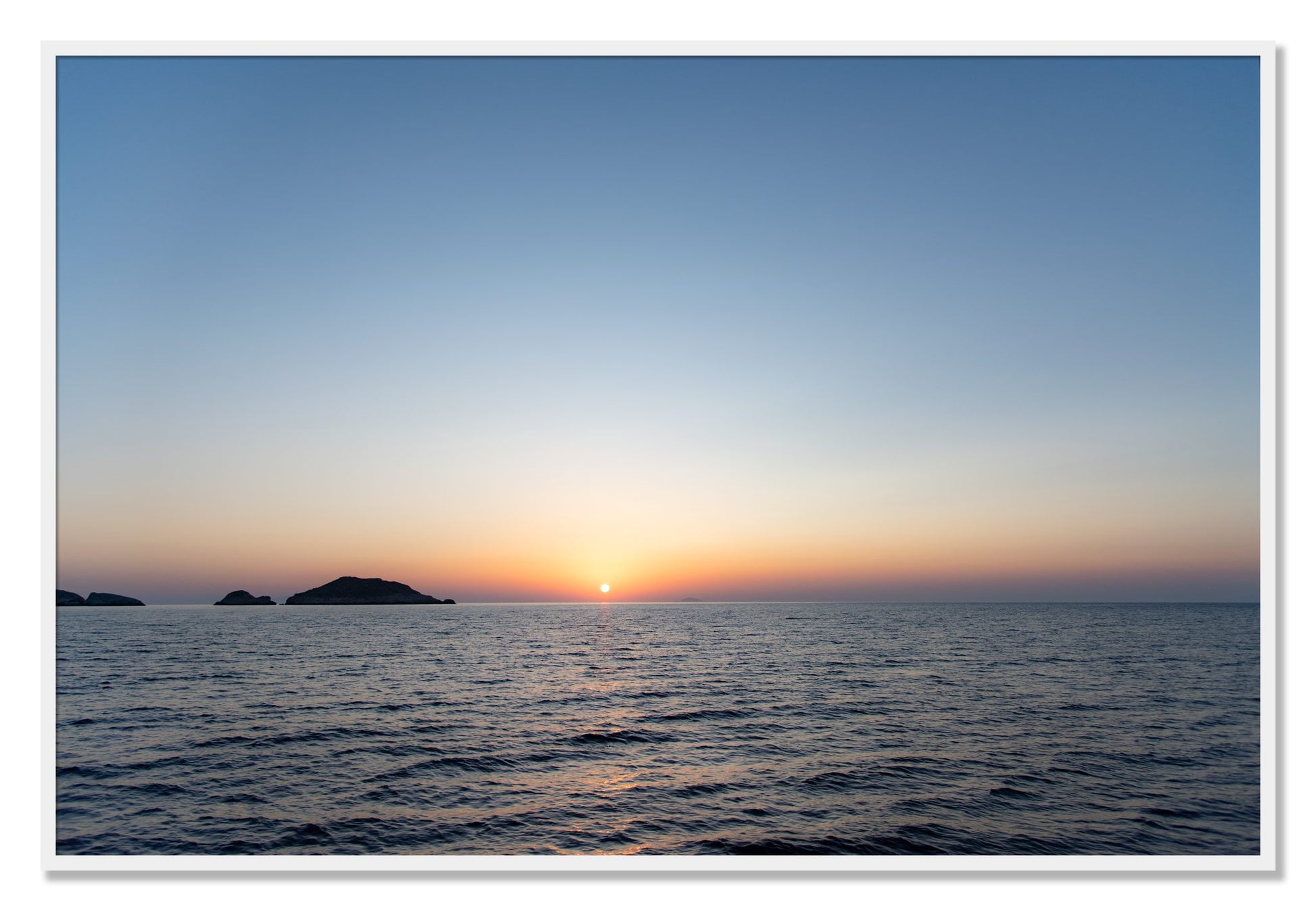 Framed photograph of Greek Ocean by Dylan Ozanich, White frame, Full Bleed