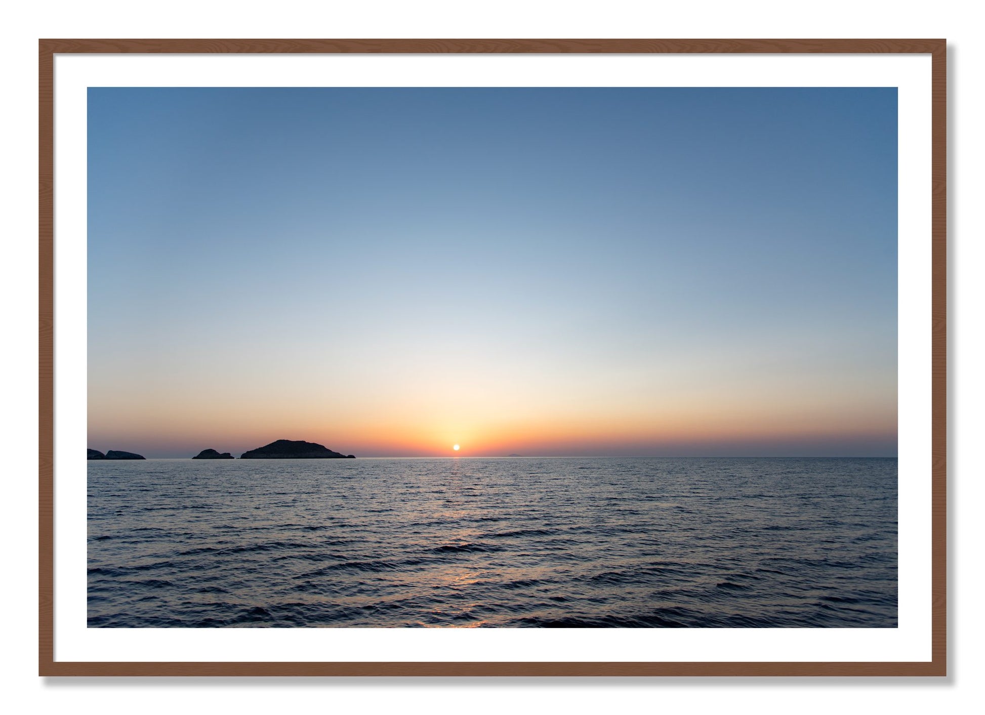 Framed photograph of Greek Ocean by Dylan Ozanich, Walnut frame, Borders