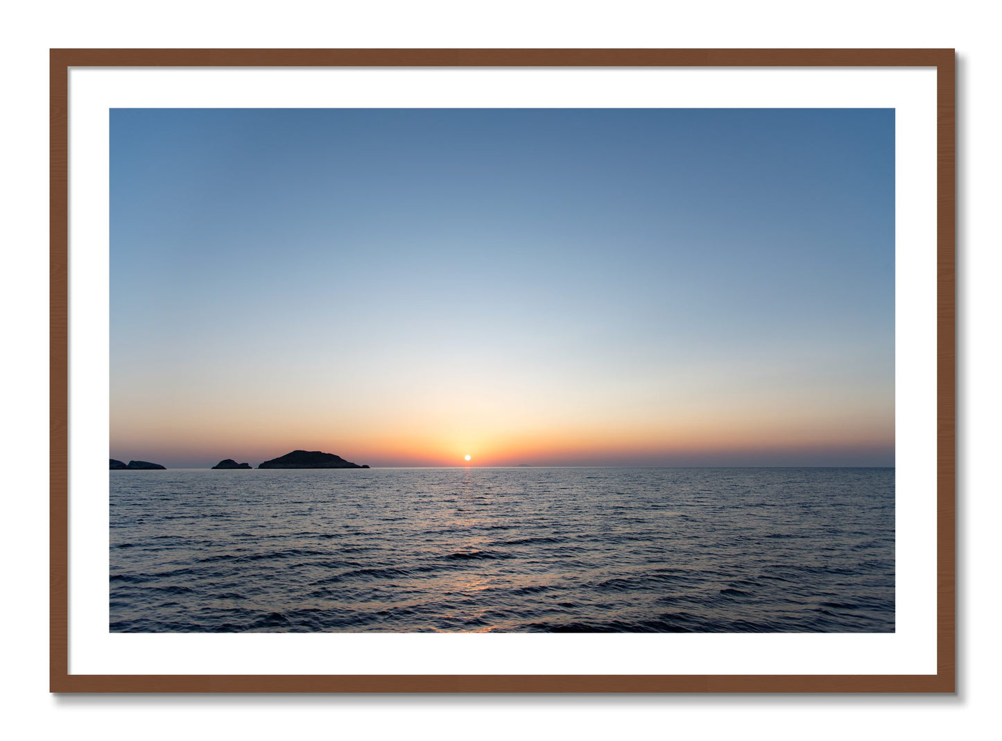 Framed photograph of Greek Ocean by Dylan Ozanich, Walnut frame, Borders