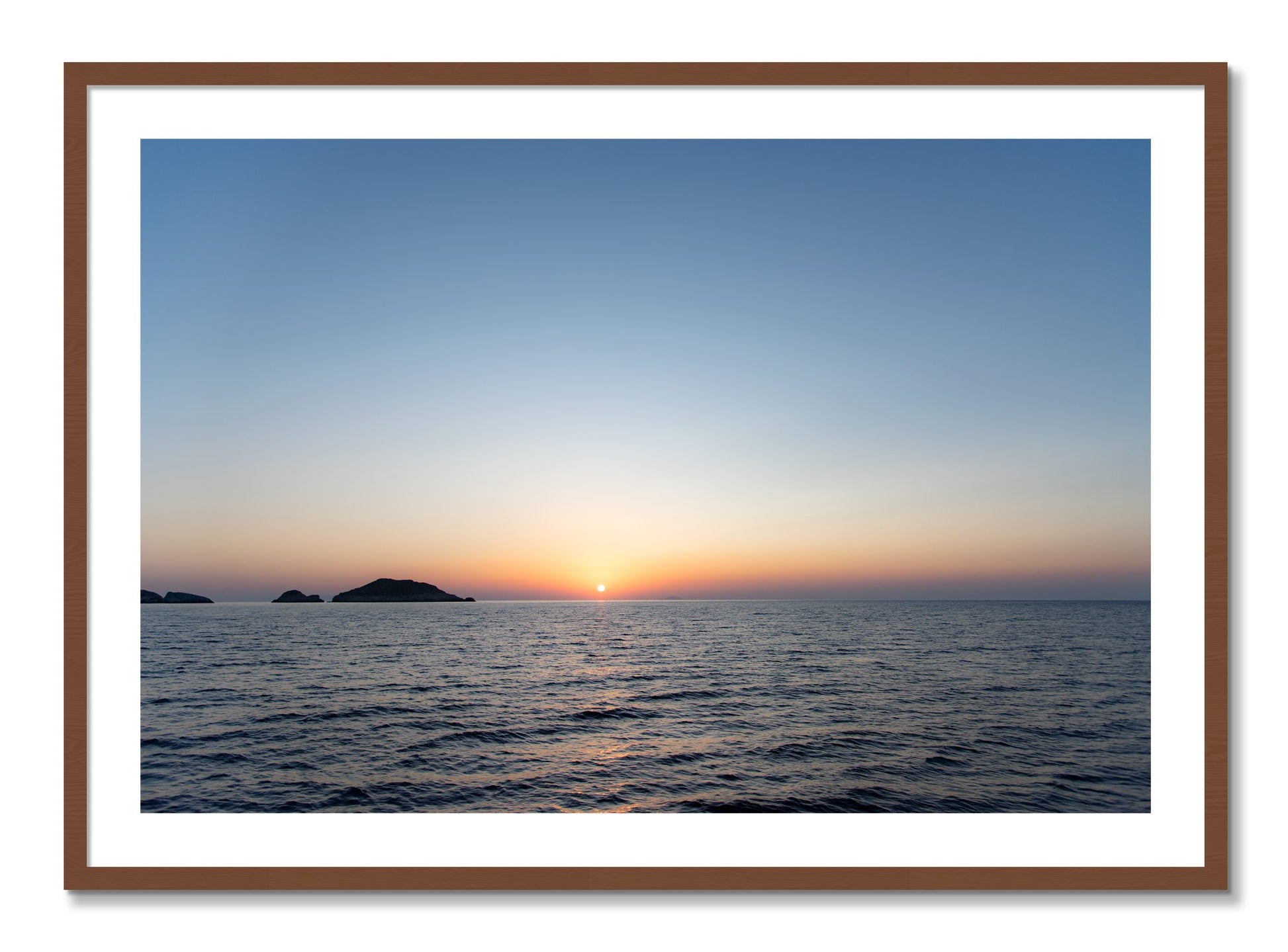 Framed photograph of Greek Ocean by Dylan Ozanich, Walnut frame, Borders