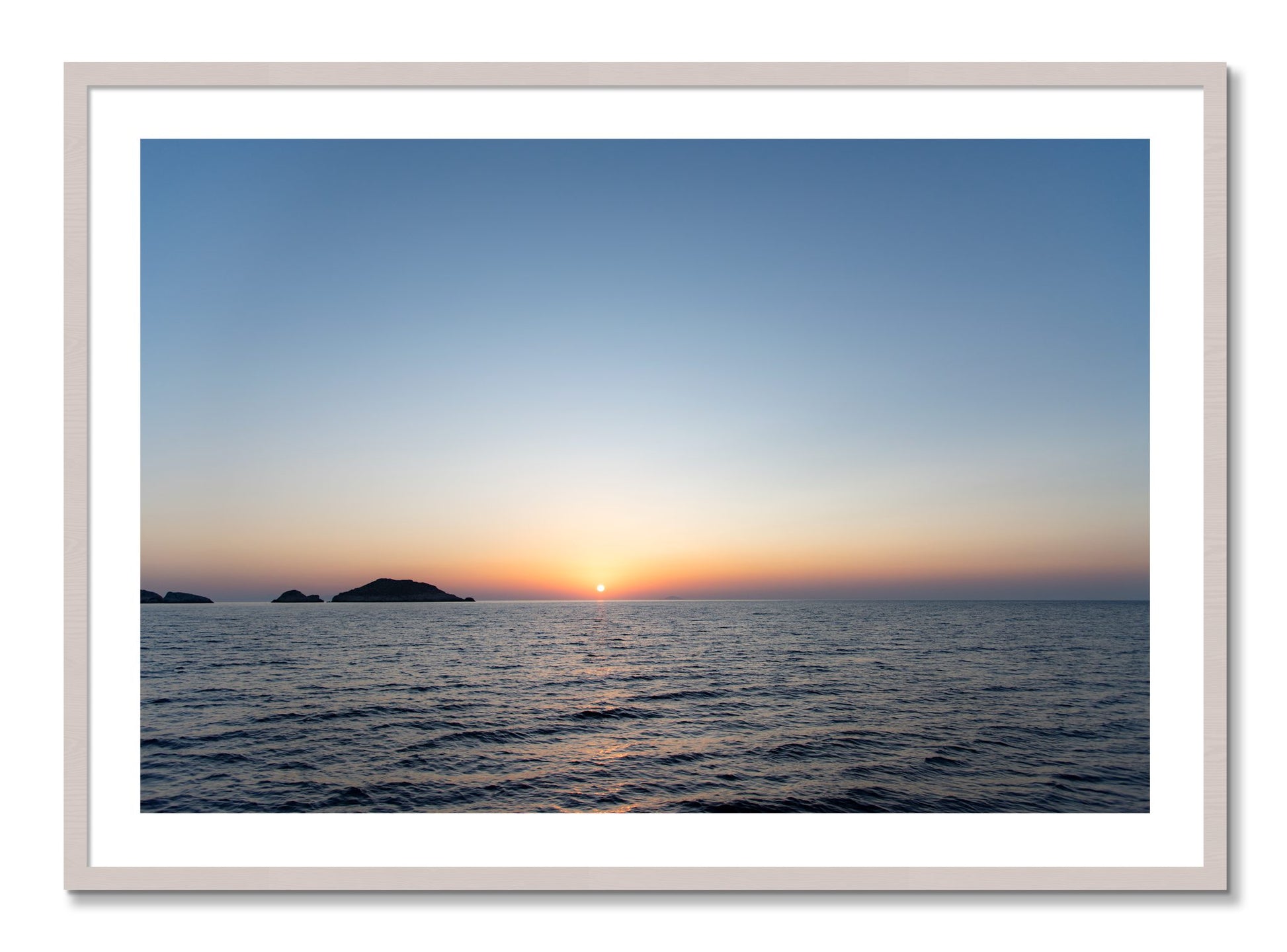 Framed photograph of Greek Ocean by Dylan Ozanich, White Maple frame, Borders