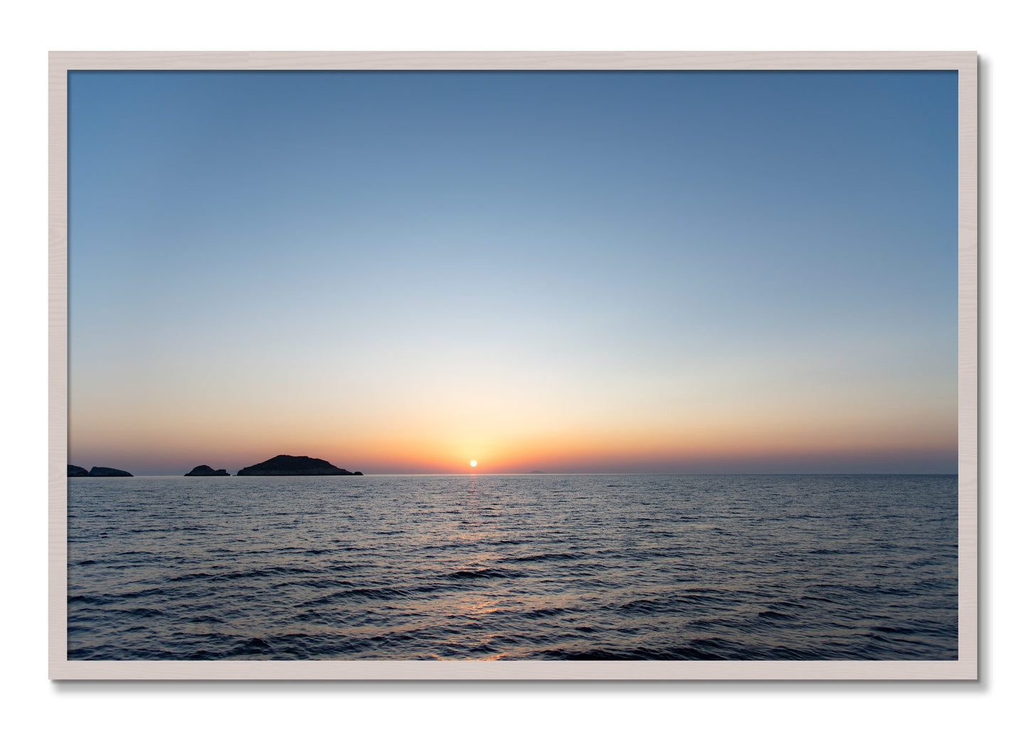 Framed photograph of Greek Ocean by Dylan Ozanich, White Maple frame, Full Bleed
