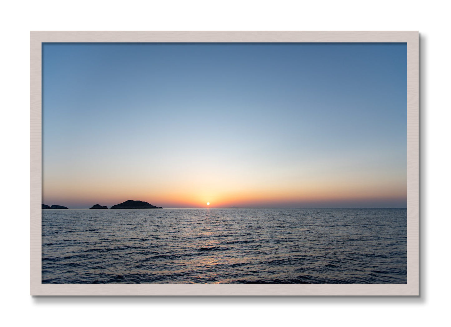 Framed photograph of Greek Ocean by Dylan Ozanich, White Maple frame, Full Bleed