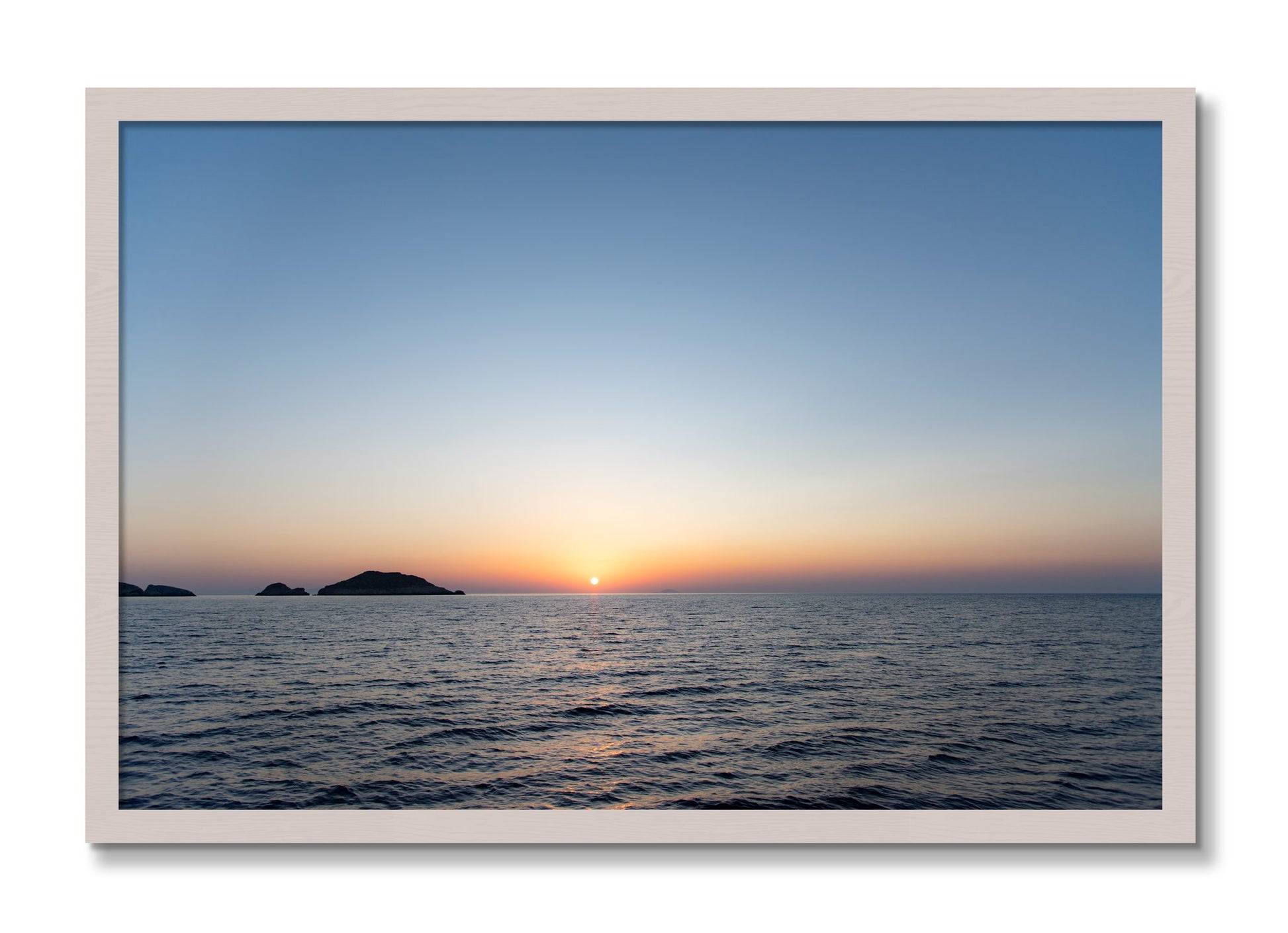 Framed photograph of Greek Ocean by Dylan Ozanich, White Maple frame, Full Bleed