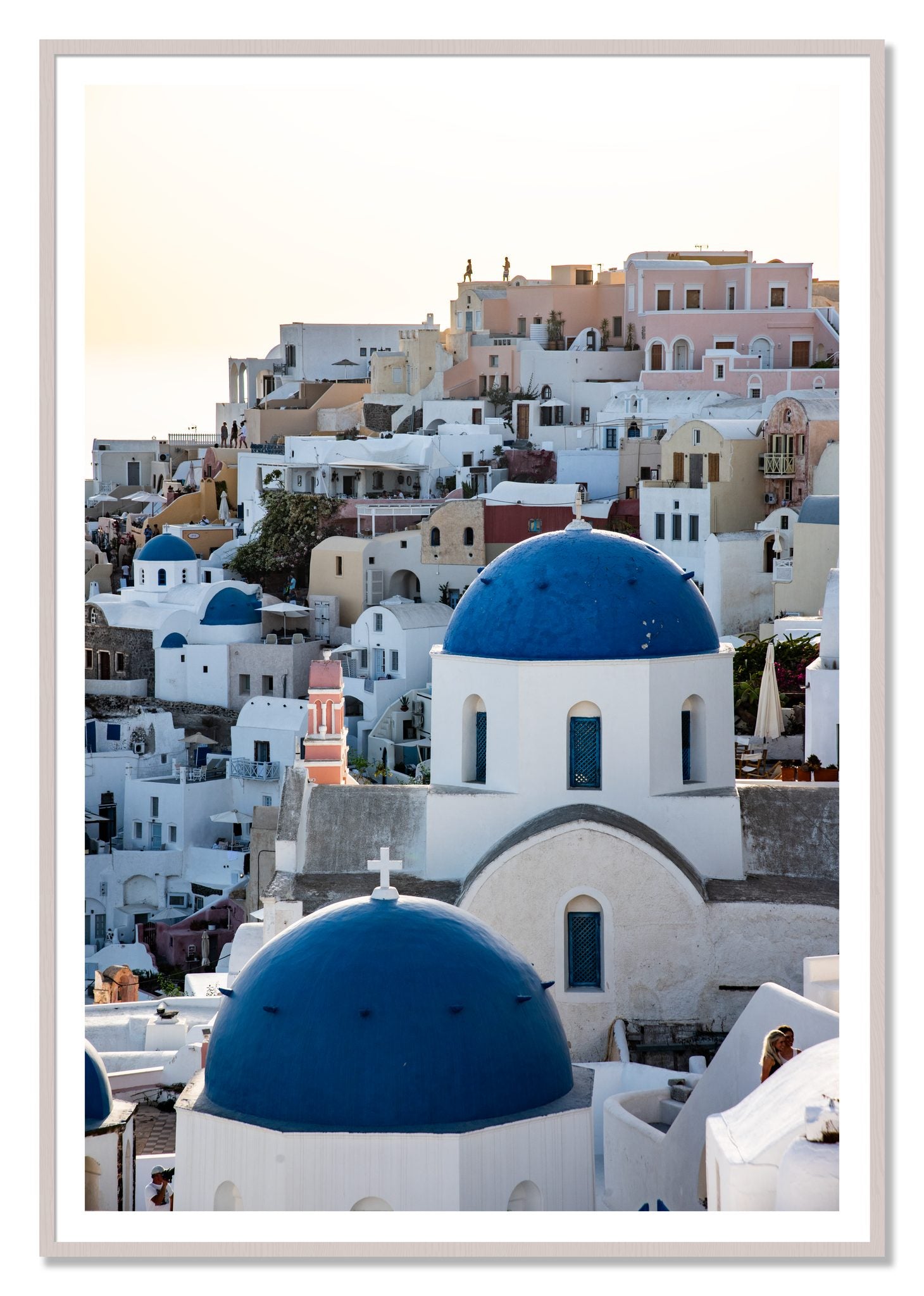 Greek Village by Dylan Ozanich, 48×72 print with a White Border in a White Maple frame