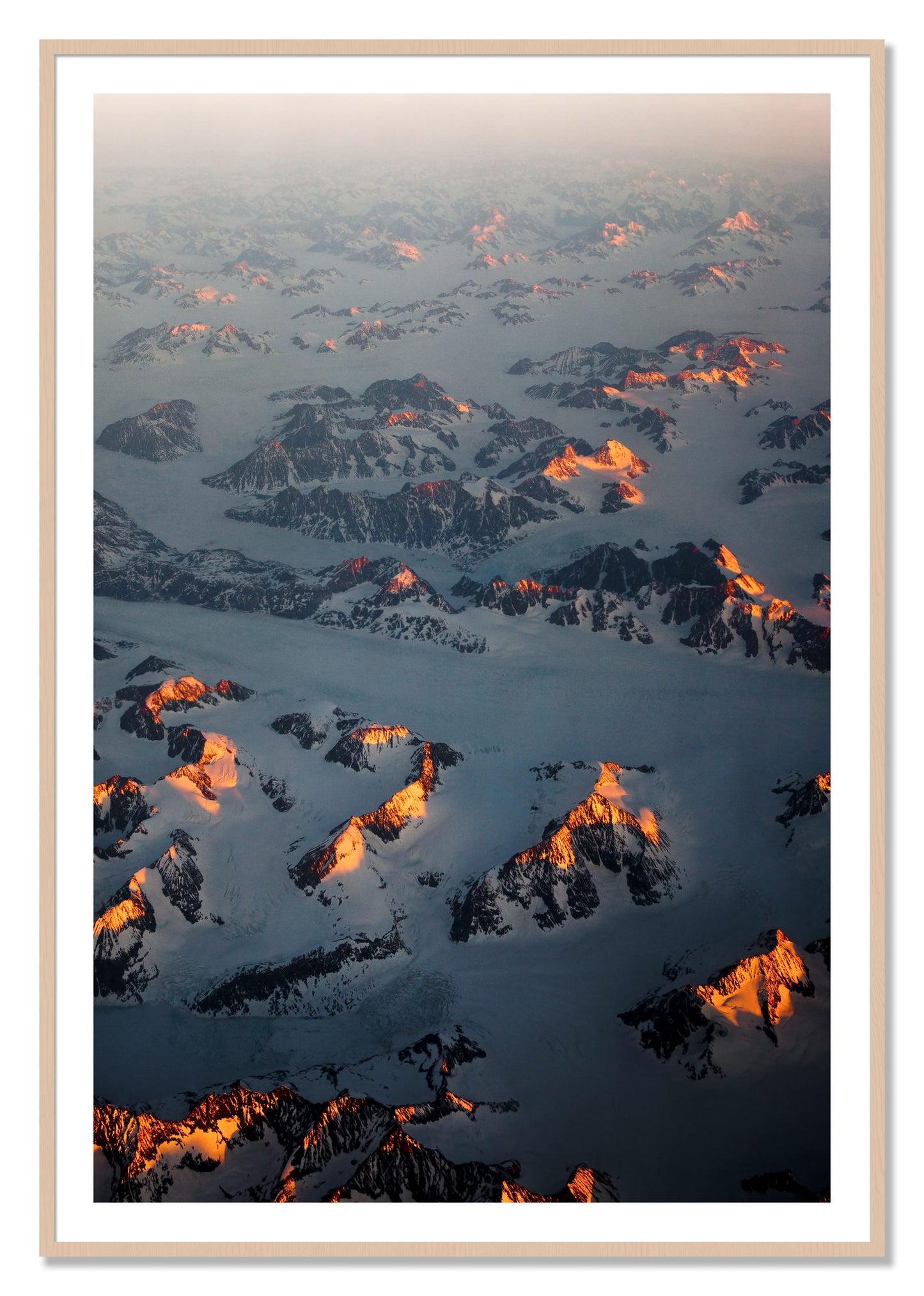 Framed photograph of Greenland Light by Dylan Ozanich, Maple frame, Borders