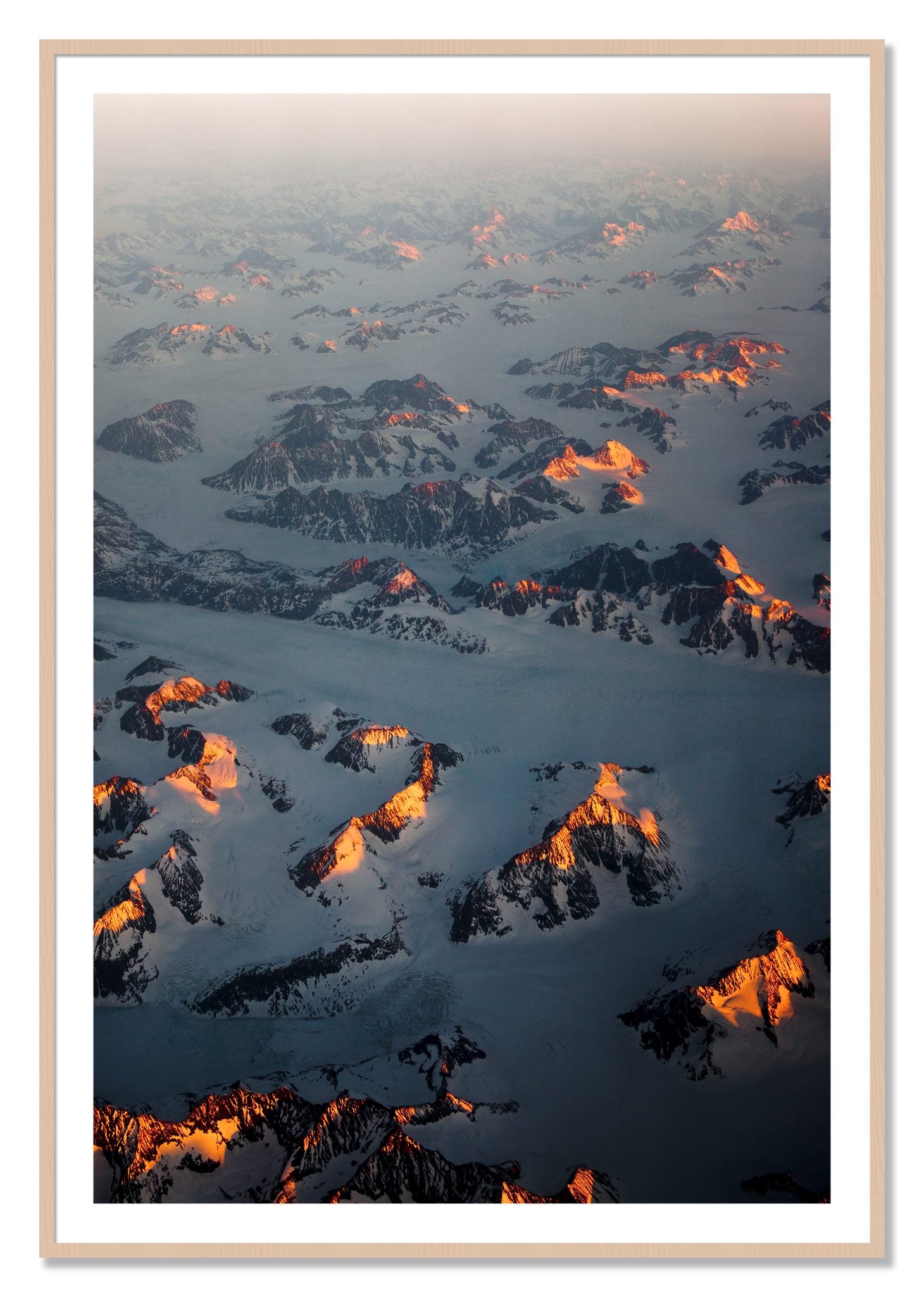 Framed photograph of Greenland Light by Dylan Ozanich, Maple frame, Borders