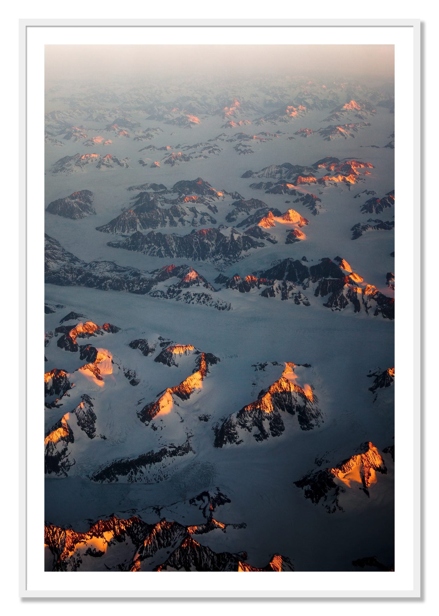 Framed photograph of Greenland Light by Dylan Ozanich, White frame, Borders