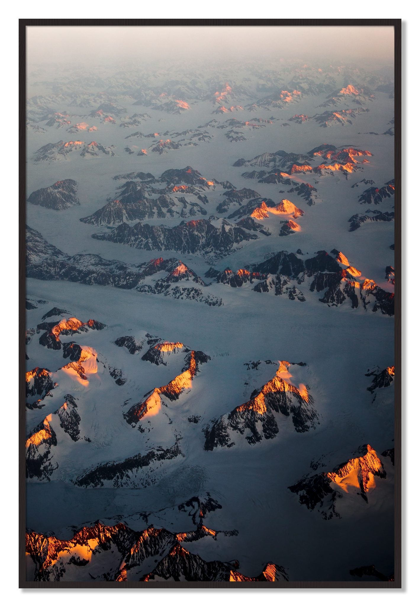 Framed photograph of Greenland Light by Dylan Ozanich, Black Walnut frame, Full Bleed