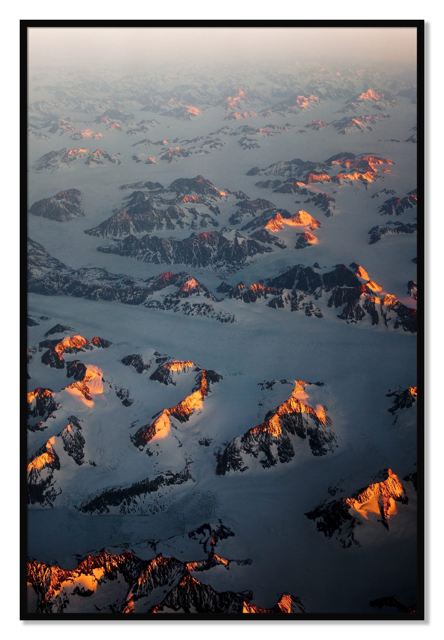 Framed photograph of Greenland Light by Dylan Ozanich, Black frame, Full Bleed