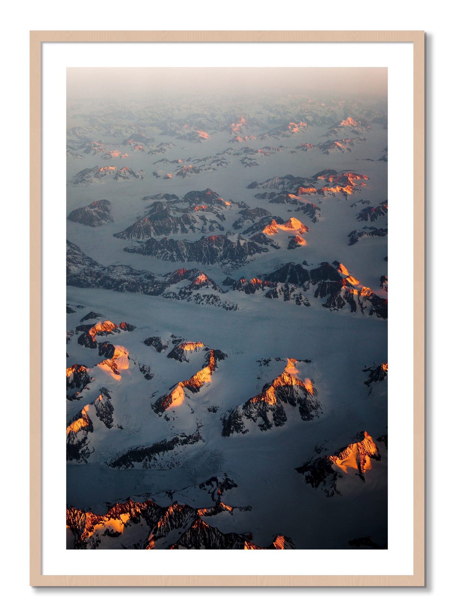 Framed photograph of Greenland Light by Dylan Ozanich, Maple frame, Borders
