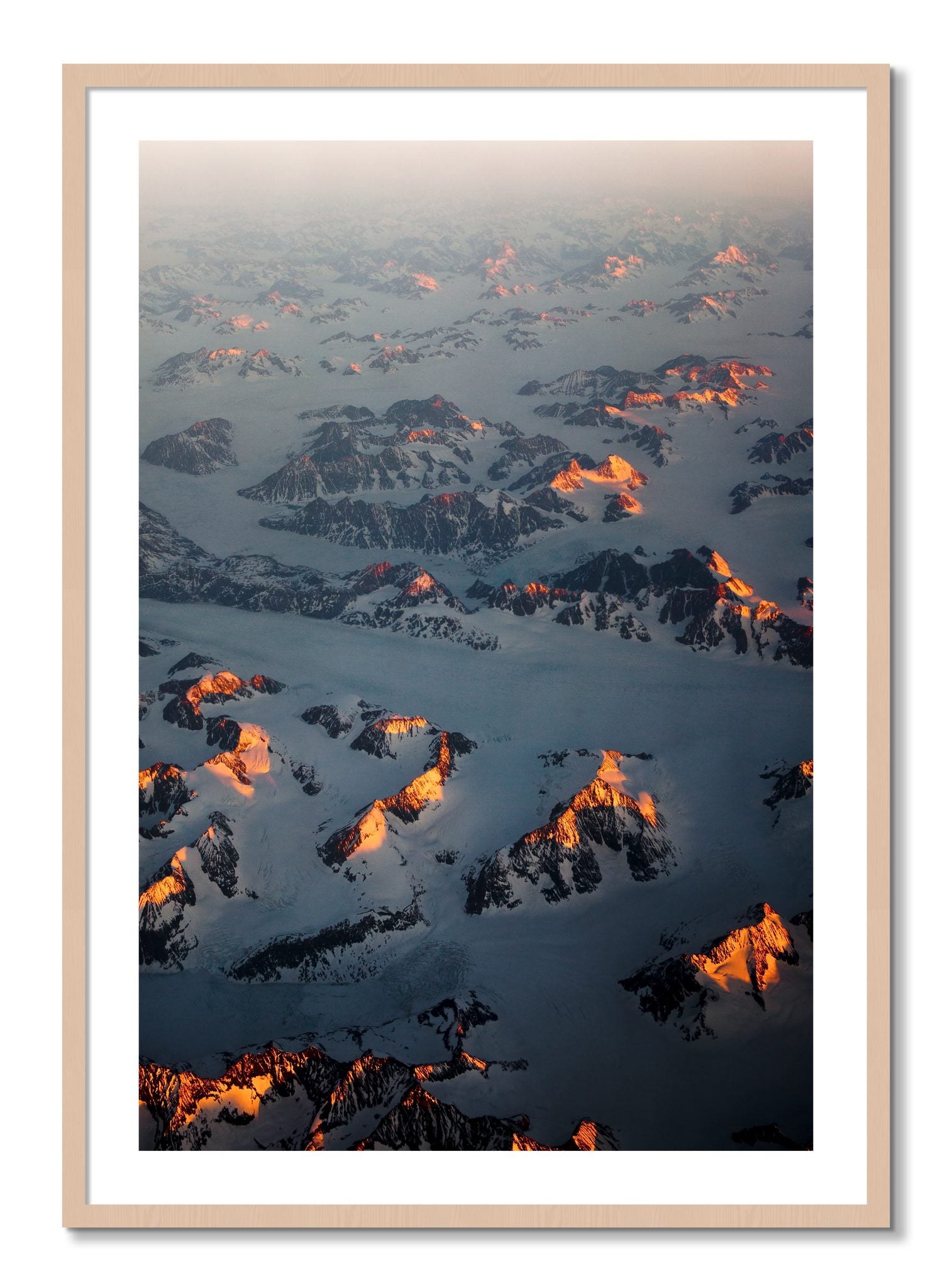 Framed photograph of Greenland Light by Dylan Ozanich, Maple frame, Borders