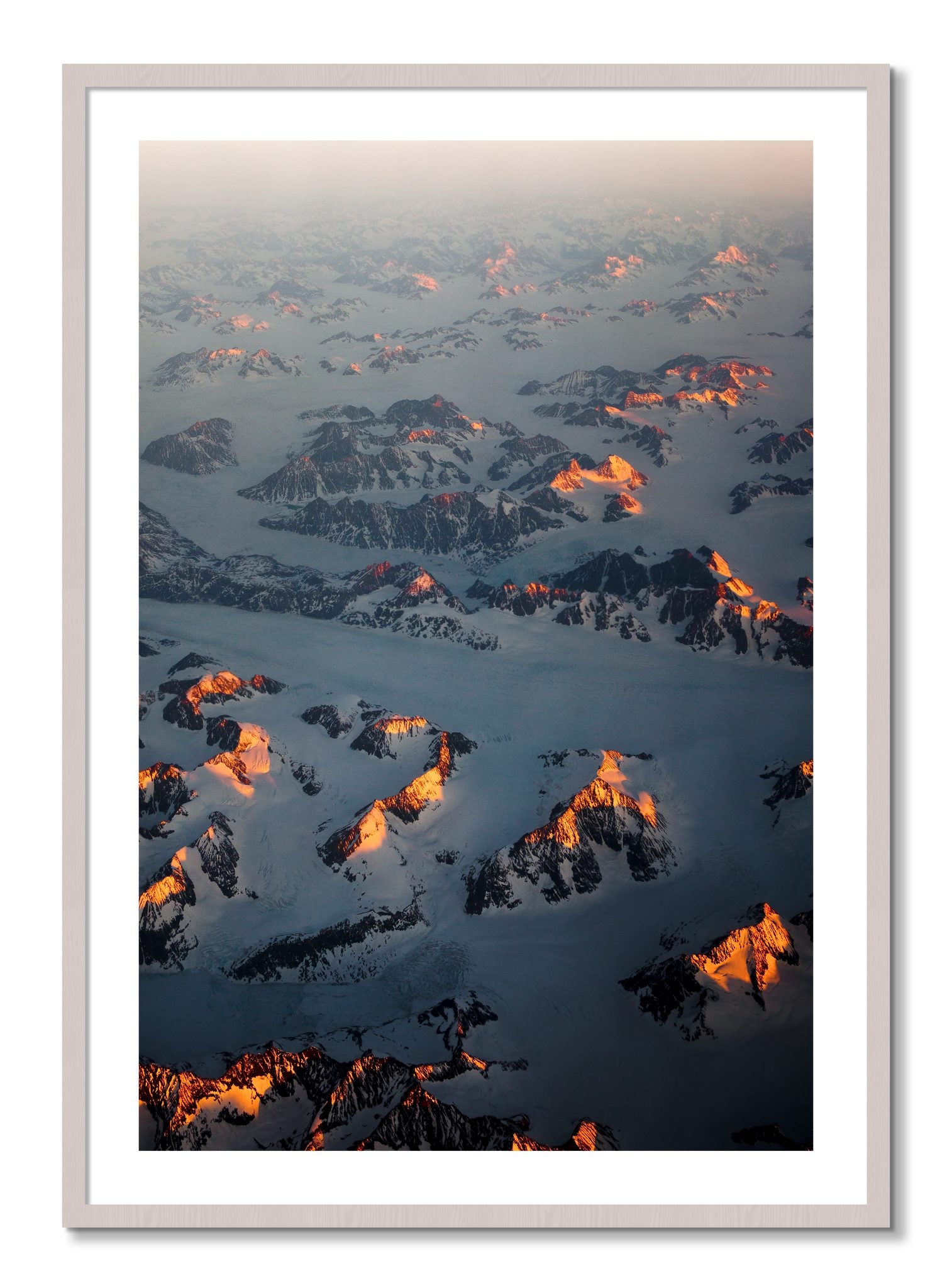 Framed photograph of Greenland Light by Dylan Ozanich, White Maple frame, Borders