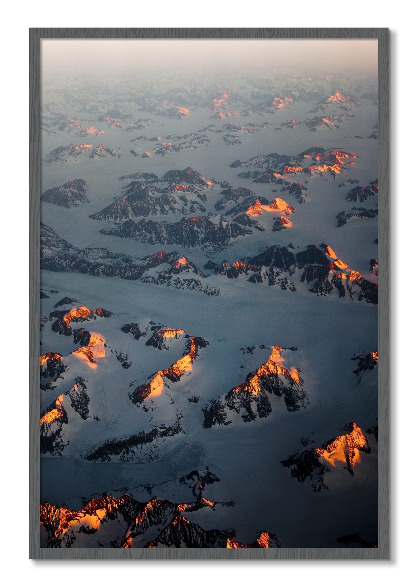 Framed photograph of Greenland Light by Dylan Ozanich, Grey frame, Full Bleed