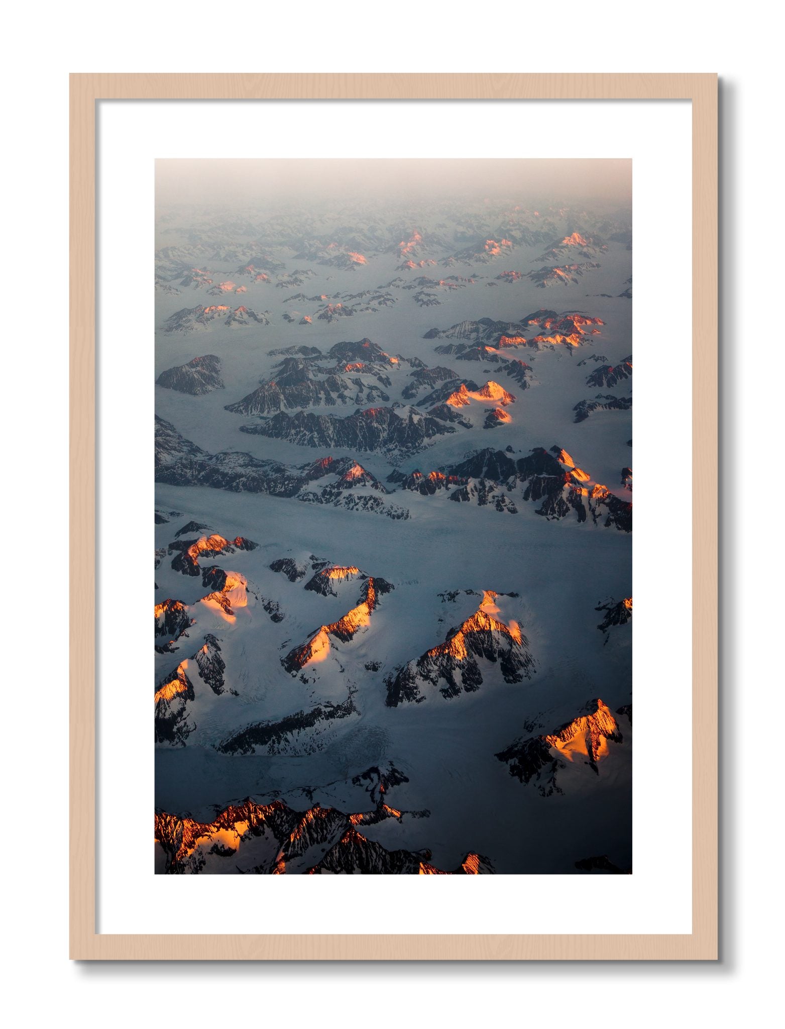Framed photograph of Greenland Light by Dylan Ozanich, Maple frame, Borders