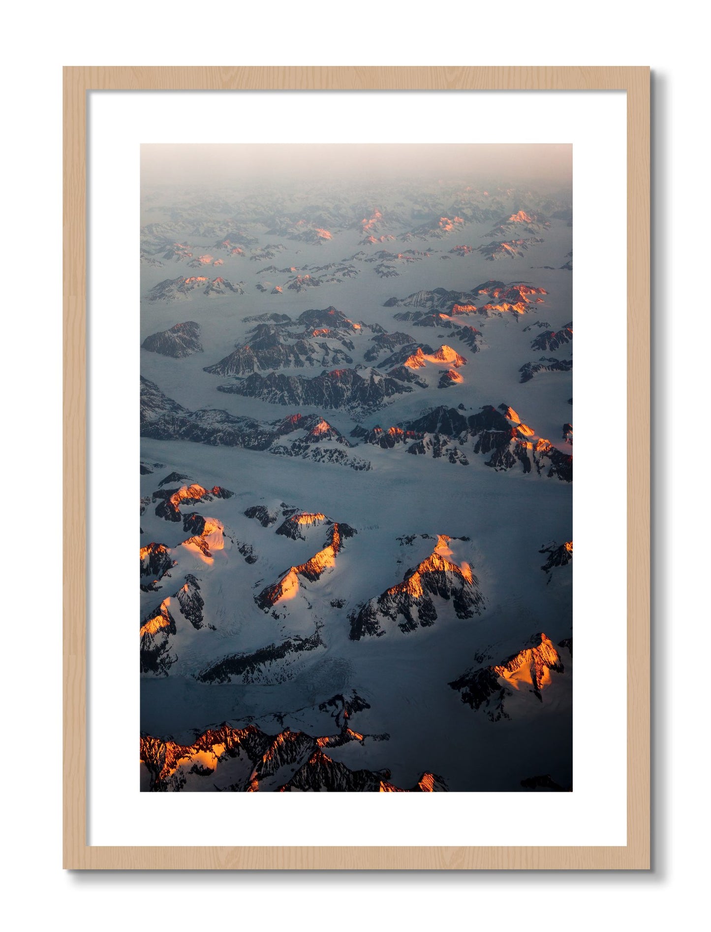 Framed photograph of Greenland Light by Dylan Ozanich, Oak frame, Borders