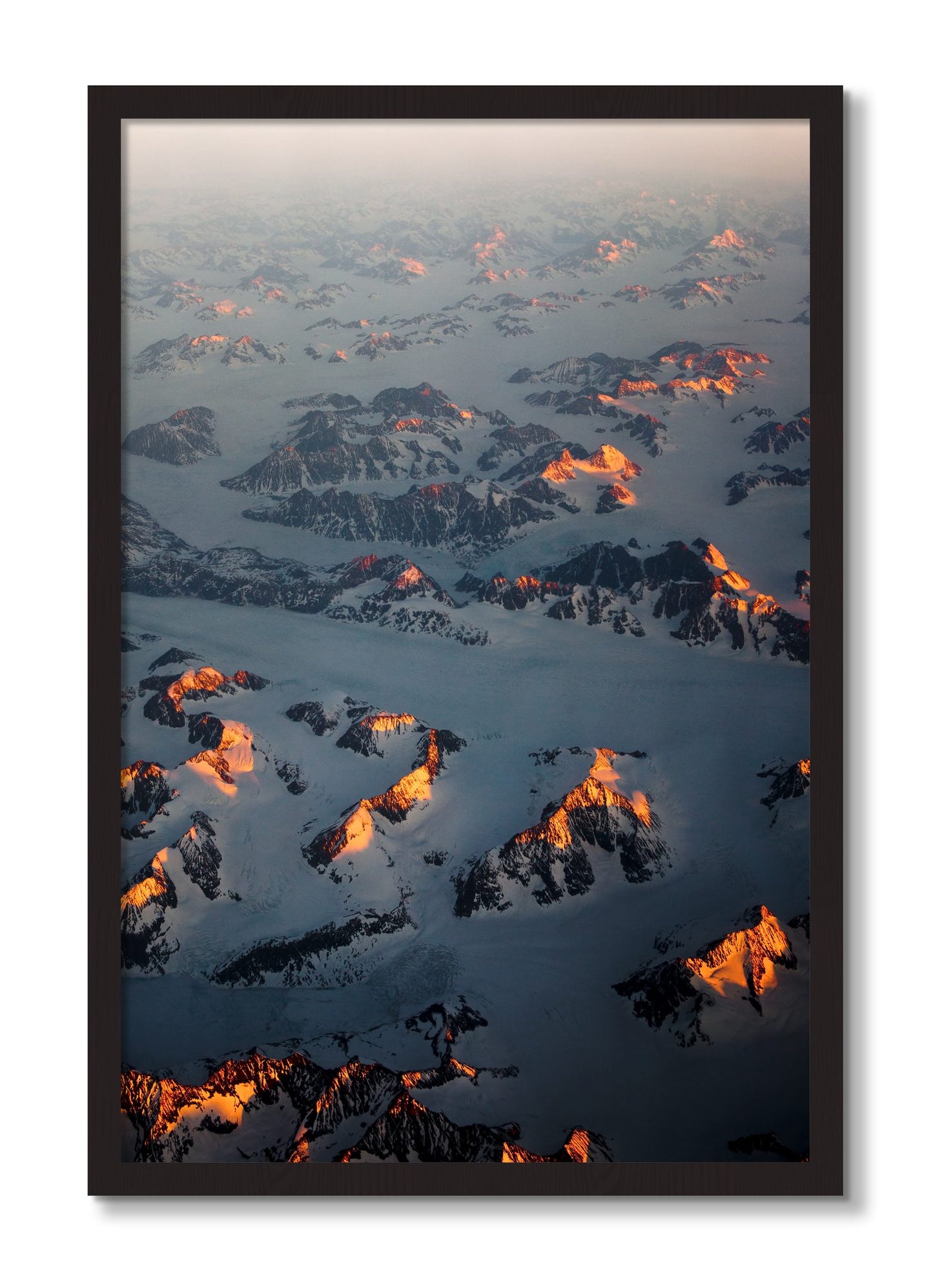 Framed photograph of Greenland Light by Dylan Ozanich, Black Walnut frame, Full Bleed