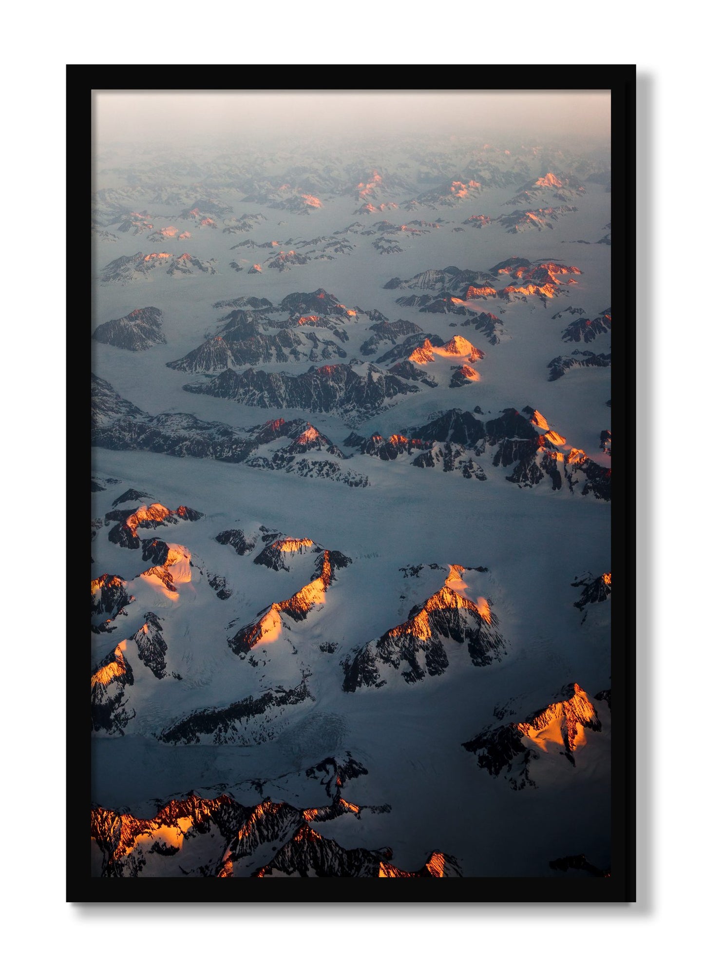 Framed photograph of Greenland Light by Dylan Ozanich, Black frame, Full Bleed