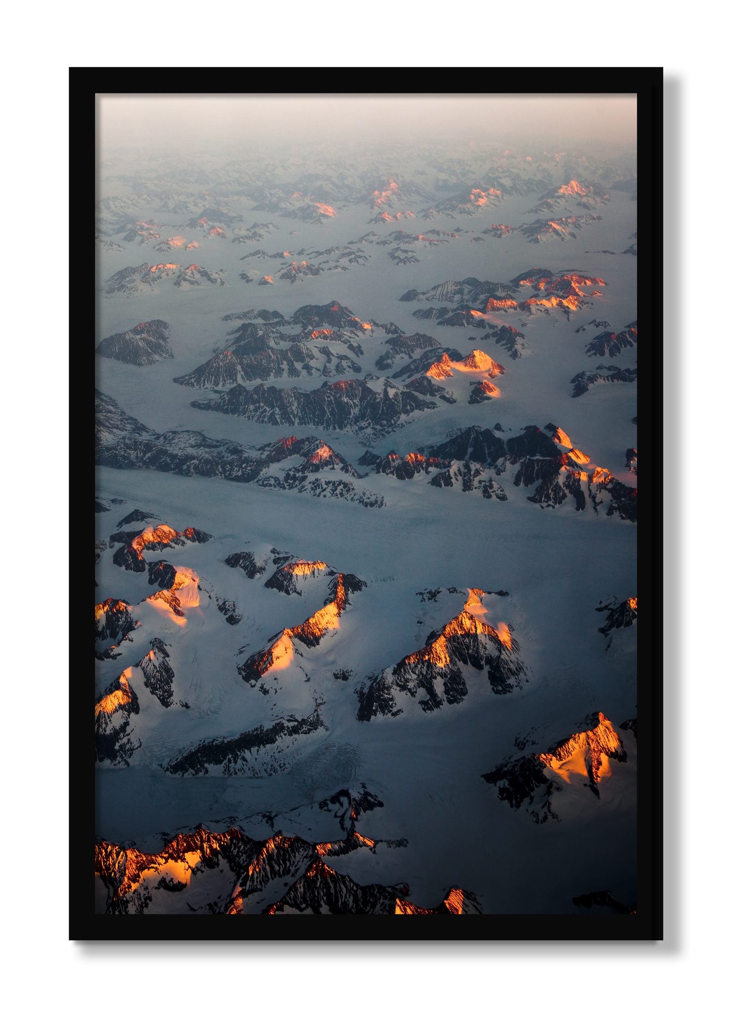 Framed photograph of Greenland Light by Dylan Ozanich, Black frame, Full Bleed