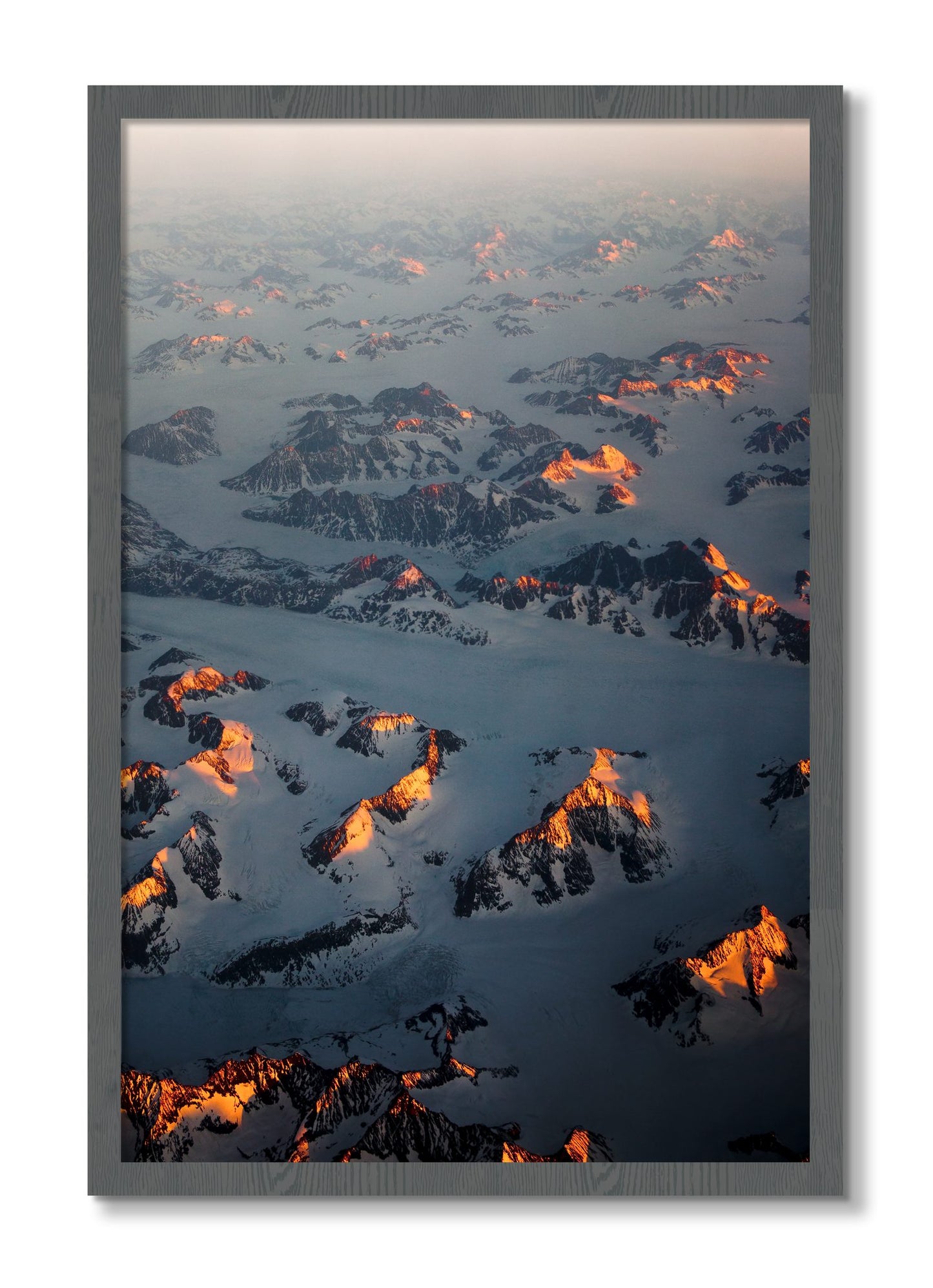 Framed photograph of Greenland Light by Dylan Ozanich, Grey frame, Full Bleed