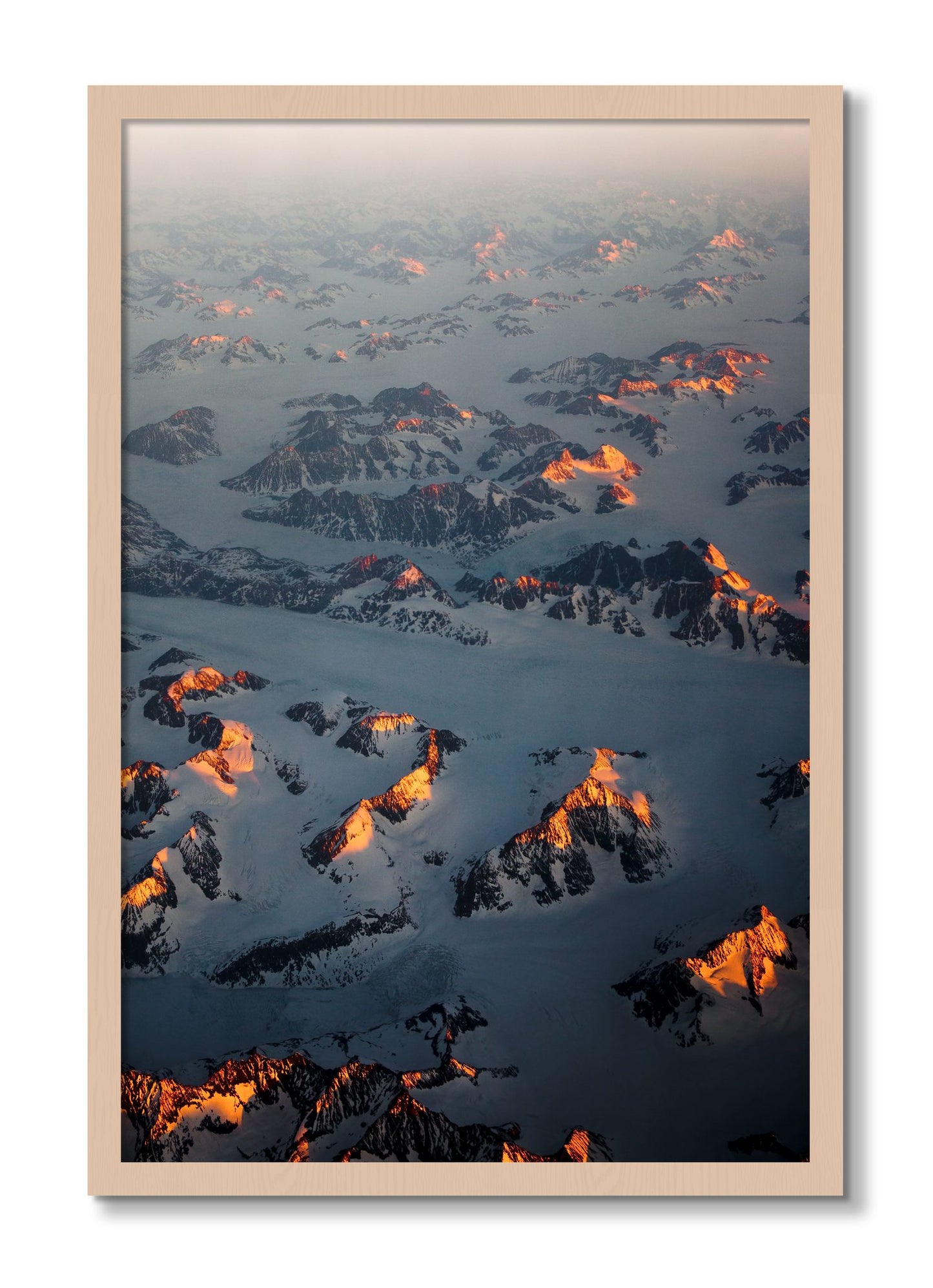 Framed photograph of Greenland Light by Dylan Ozanich, Maple frame, Full Bleed