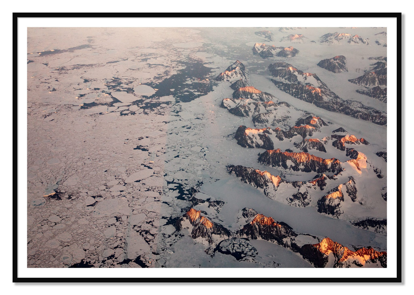 Greenland Peaks by Dylan Ozanich, 48×72 print with a White Border in a Black frame