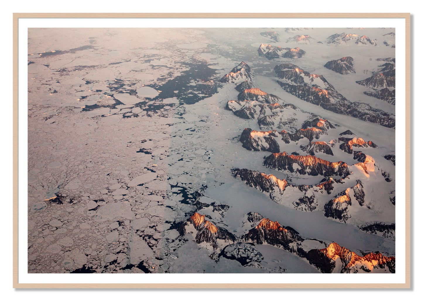 Greenland Peaks by Dylan Ozanich, 48×72 print with a White Border in a Maple frame