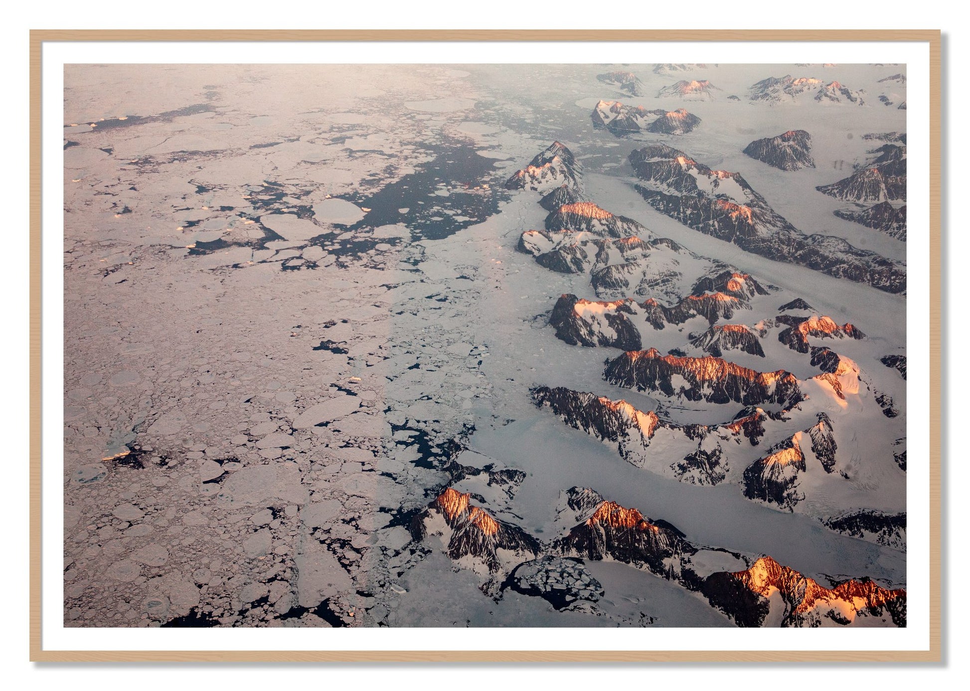 Greenland Peaks by Dylan Ozanich, 48×72 print with a White Border in an Oak frame