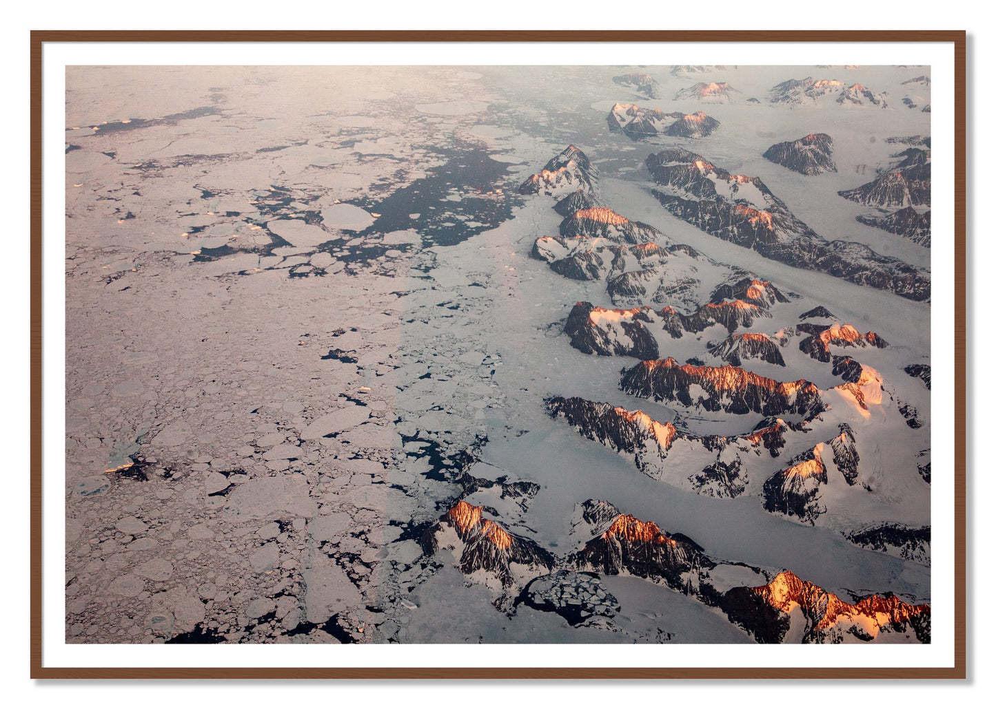 Greenland Peaks by Dylan Ozanich, 48×72 print with a White Border in a Walnut frame