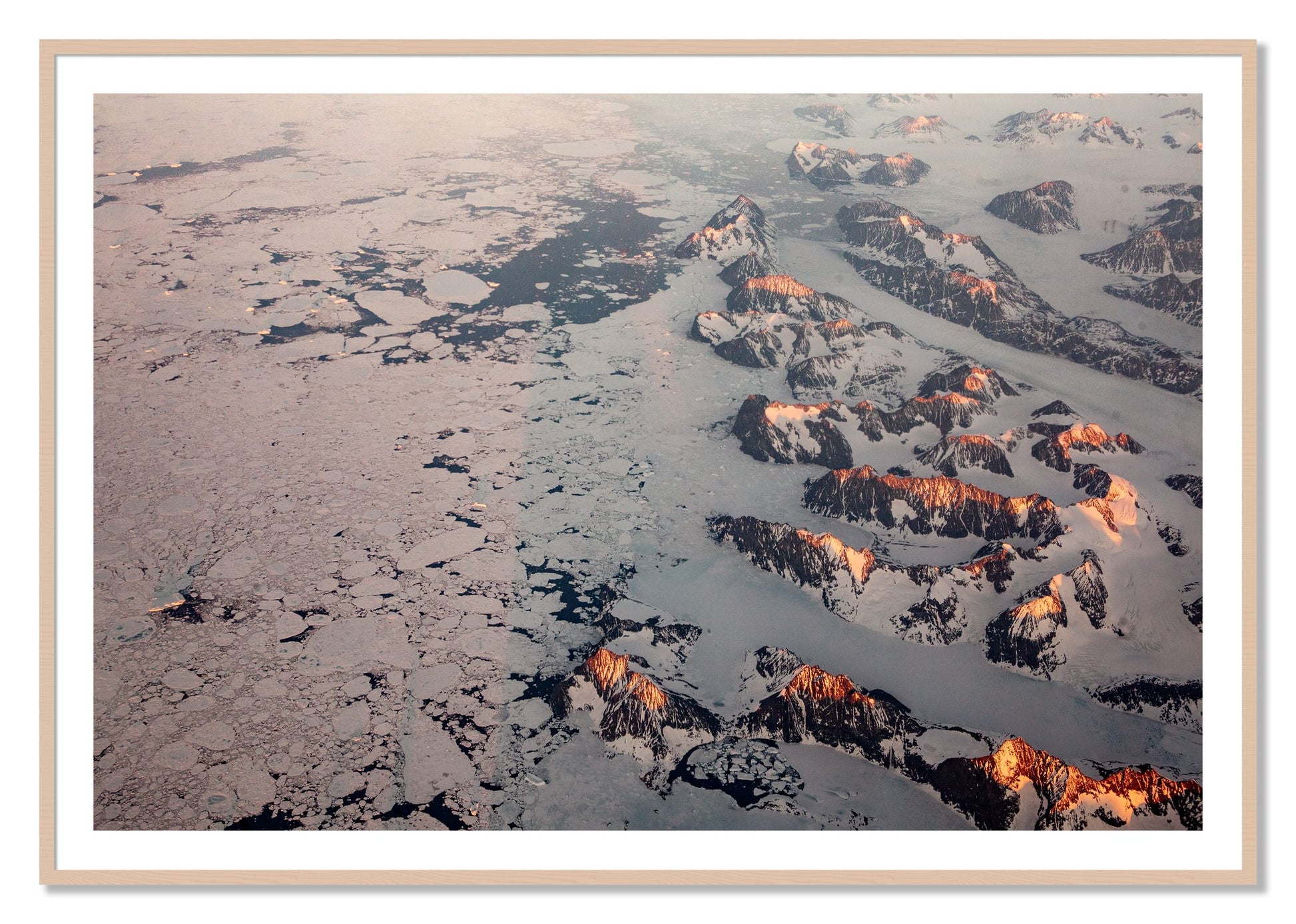 Framed photograph of Greenland Peaks by Dylan Ozanich, Maple frame, Borders