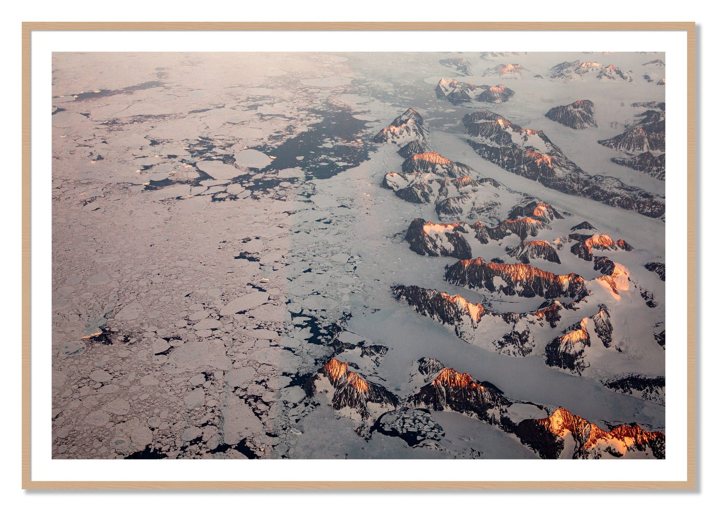 Framed photograph of Greenland Peaks by Dylan Ozanich, Oak frame, Borders