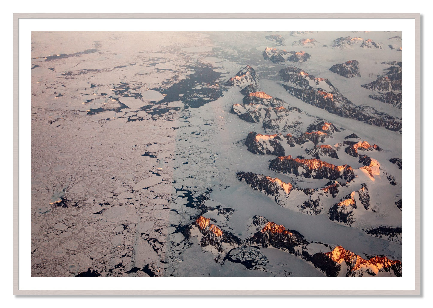 Framed photograph of Greenland Peaks by Dylan Ozanich, White Maple frame, Borders