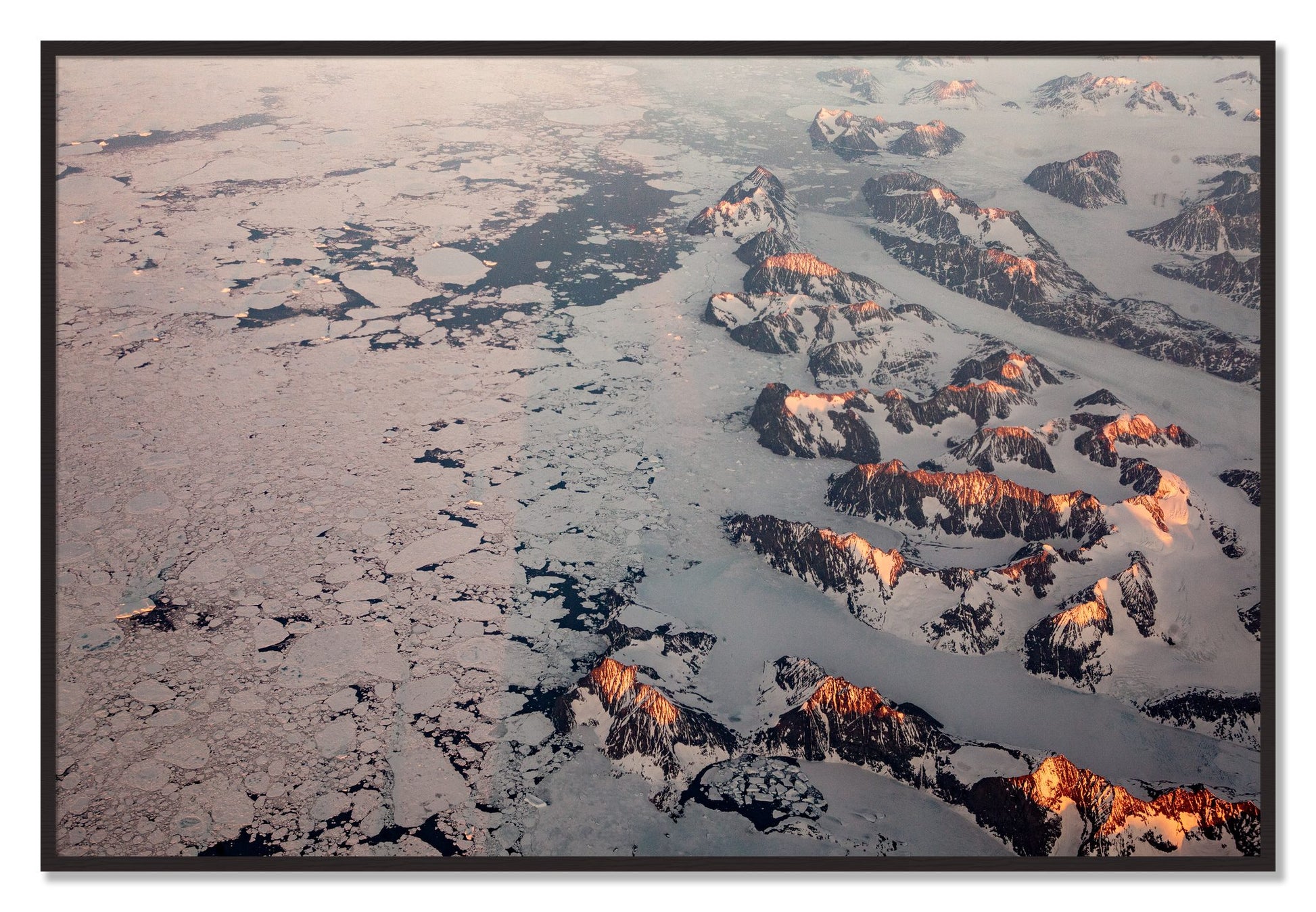 Framed photograph of Greenland Peaks by Dylan Ozanich, Black Walnut frame, Full Bleed
