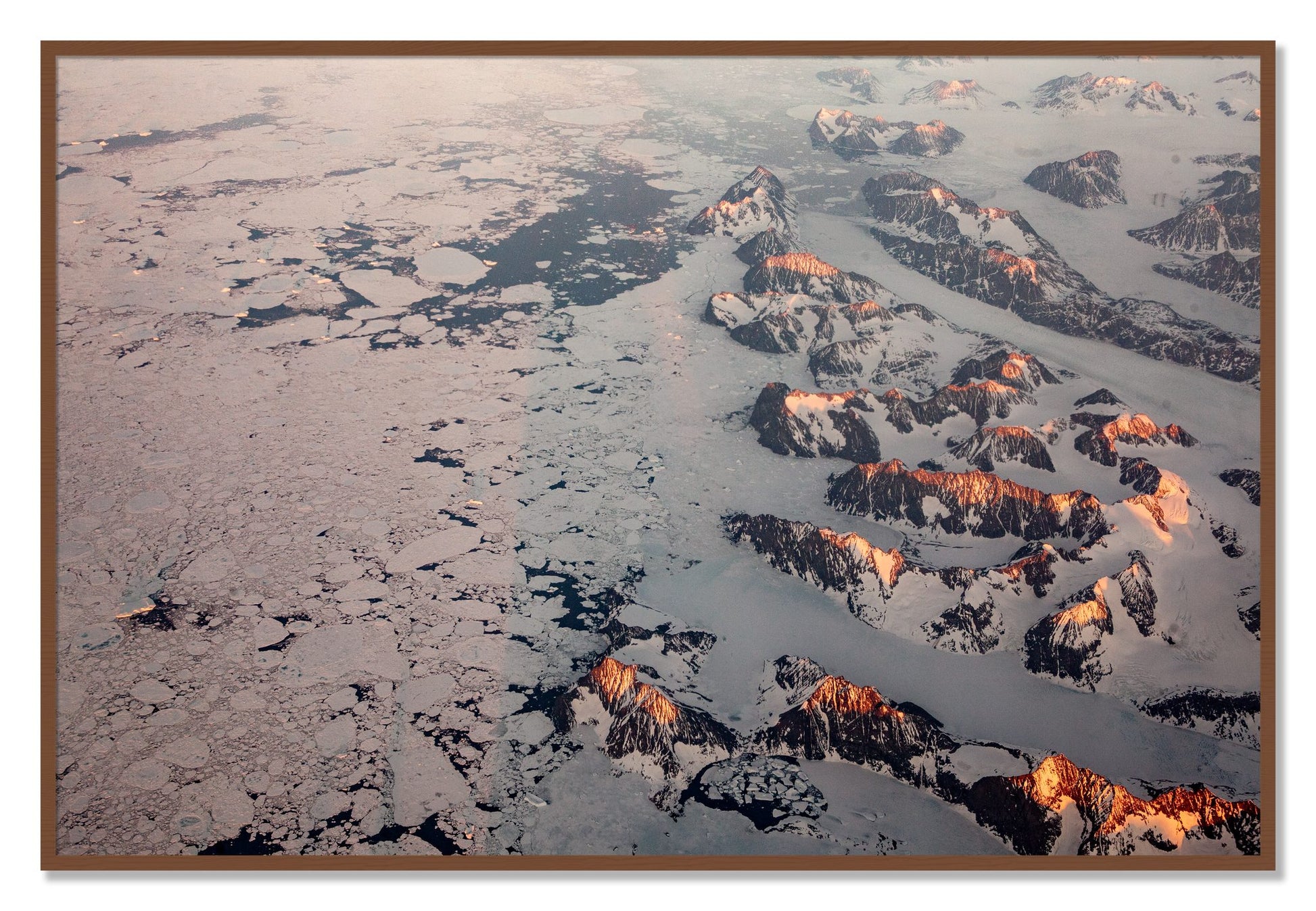Framed photograph of Greenland Peaks by Dylan Ozanich, Walnut frame, Full Bleed