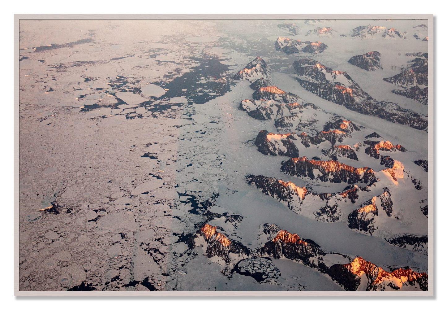 Framed photograph of Greenland Peaks by Dylan Ozanich, White Maple frame, Full Bleed