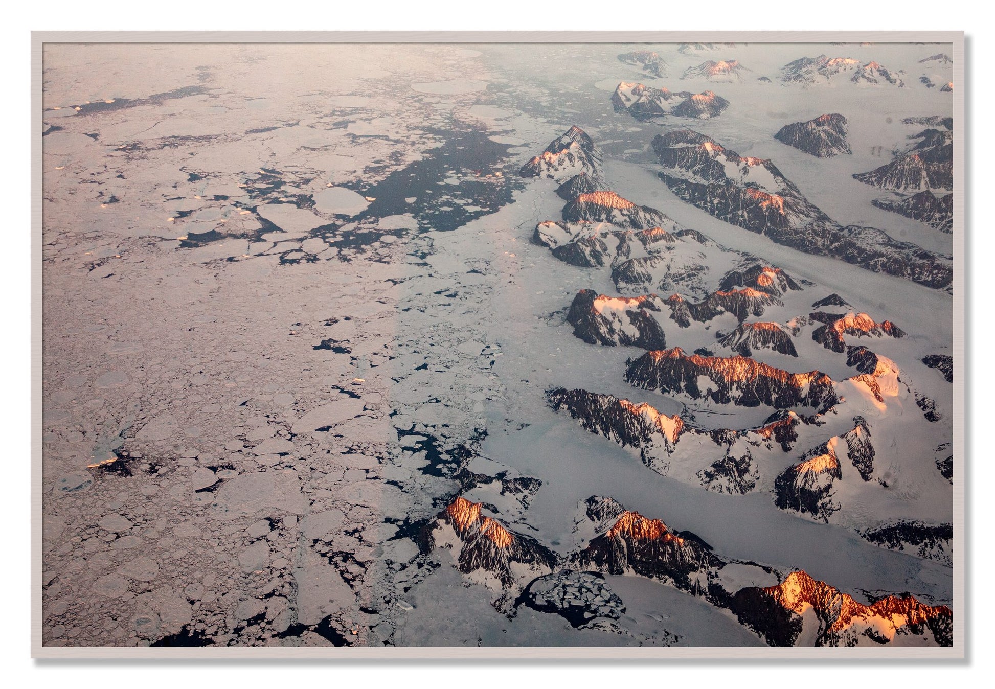 Framed photograph of Greenland Peaks by Dylan Ozanich, White Maple frame, Full Bleed