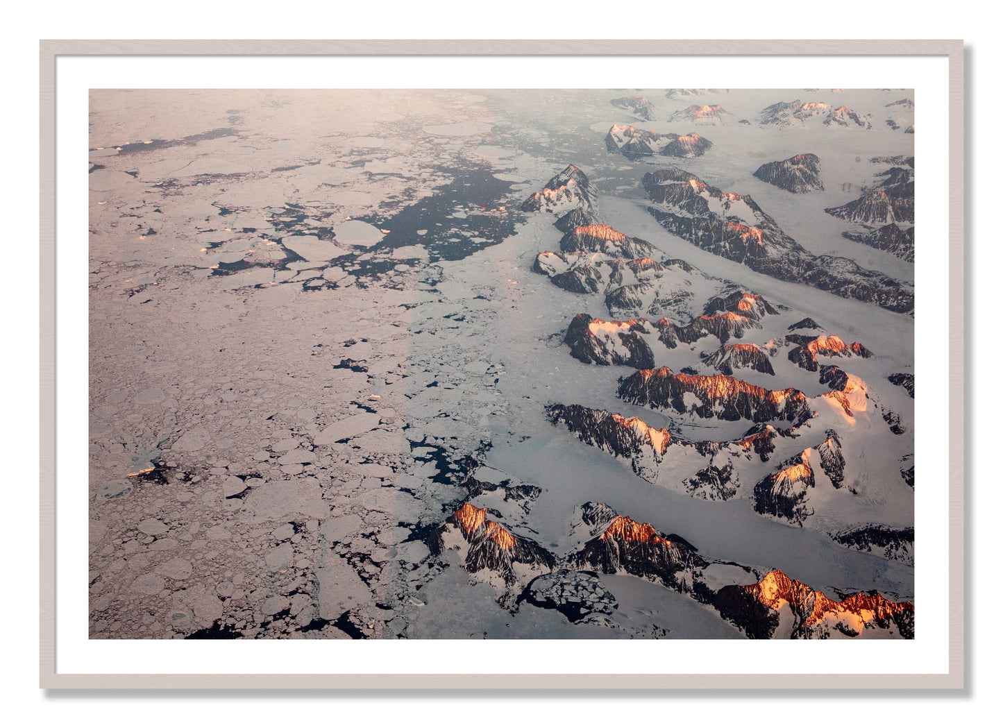 Framed photograph of Greenland Peaks by Dylan Ozanich, White Maple frame, Borders