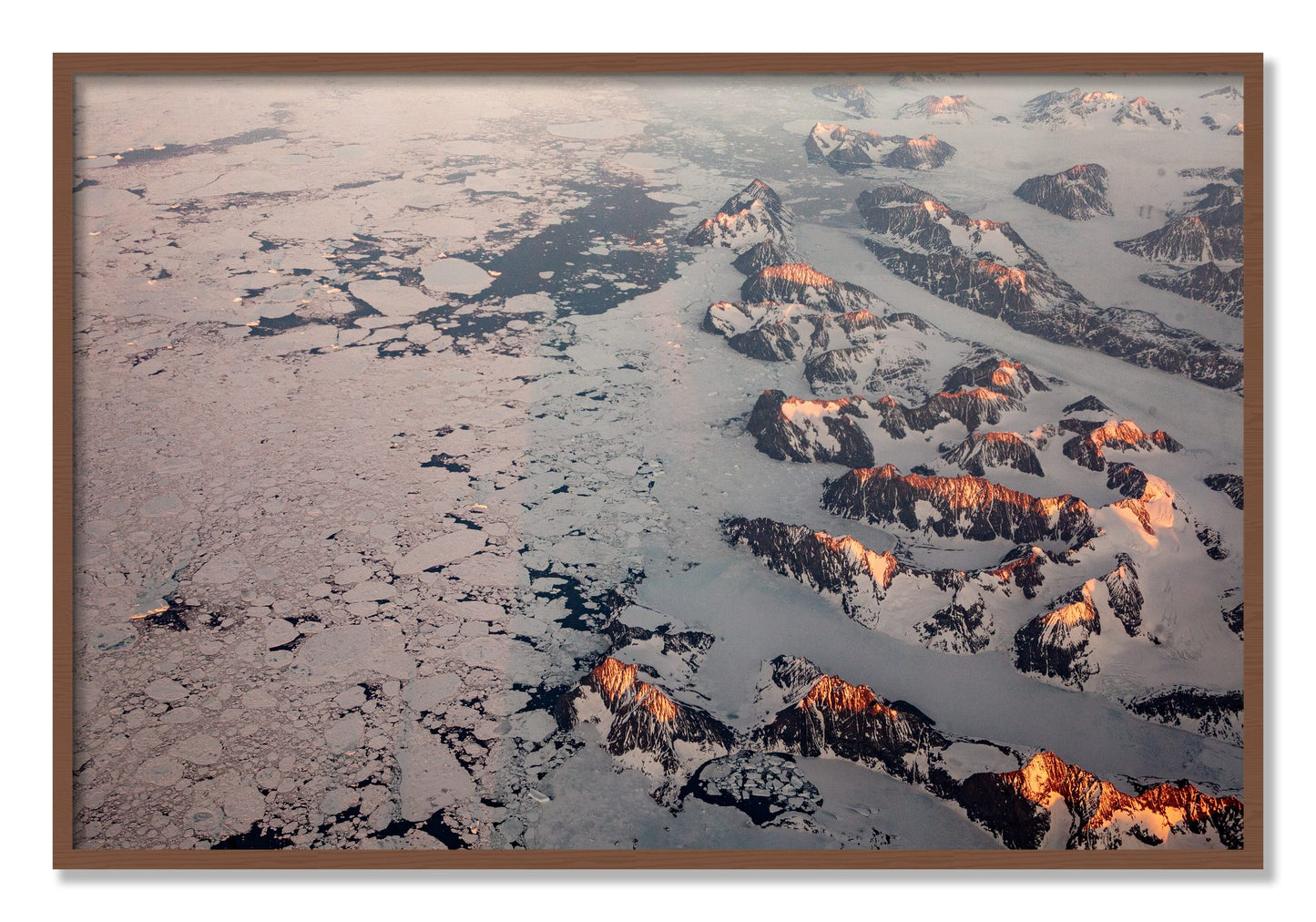 Framed photograph of Greenland Peaks by Dylan Ozanich, Walnut frame, Full Bleed