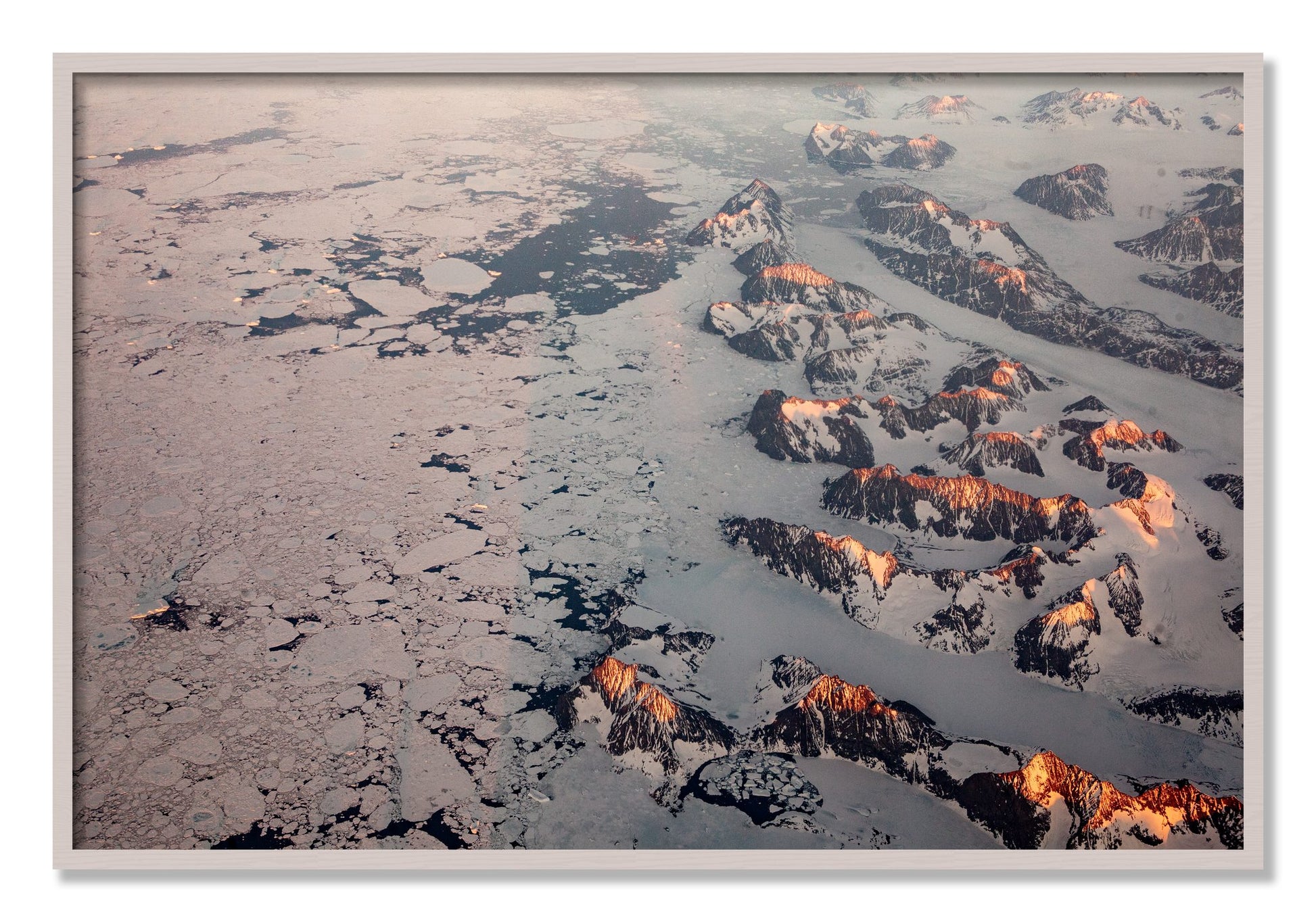 Framed photograph of Greenland Peaks by Dylan Ozanich, White Maple frame, Full Bleed