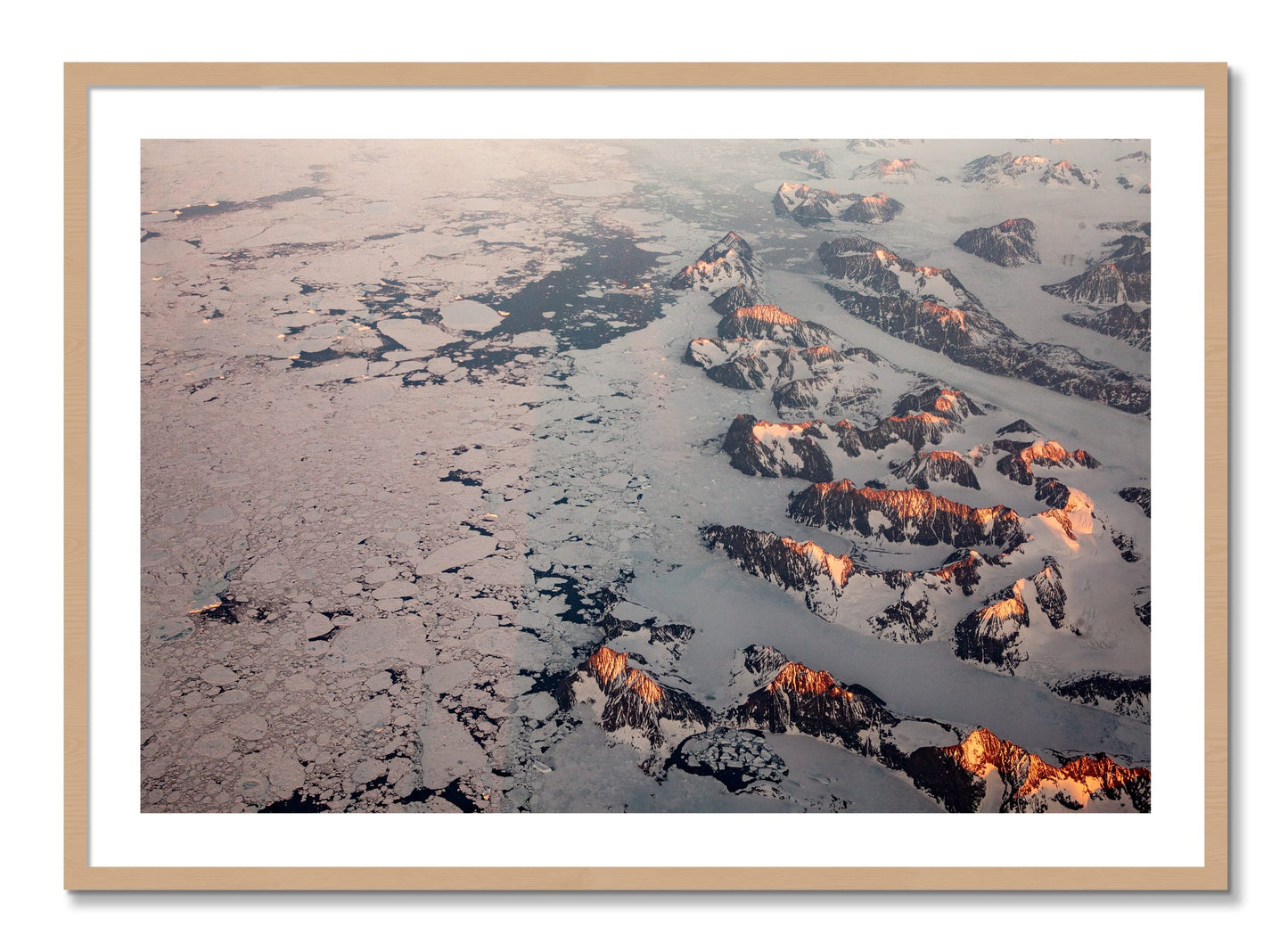 Framed photograph of Greenland Peaks by Dylan Ozanich, Oak frame, Borders