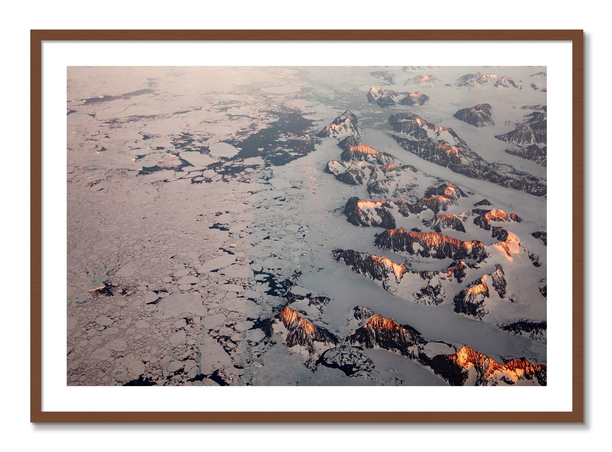 Framed photograph of Greenland Peaks by Dylan Ozanich, Walnut frame, Borders