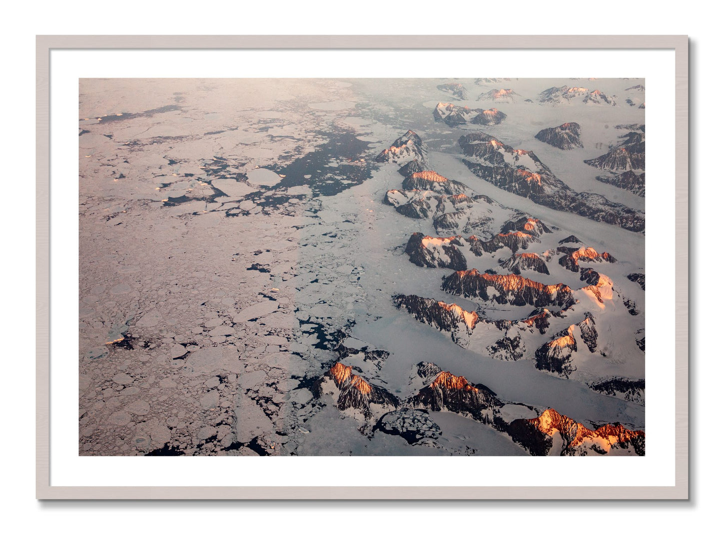 Framed photograph of Greenland Peaks by Dylan Ozanich, White Maple frame, Borders