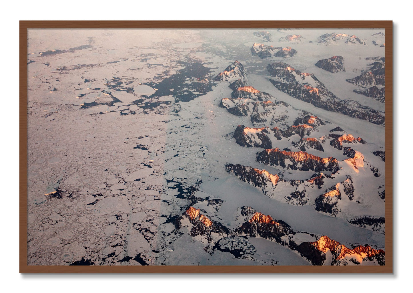Framed photograph of Greenland Peaks by Dylan Ozanich, Walnut frame, Full Bleed