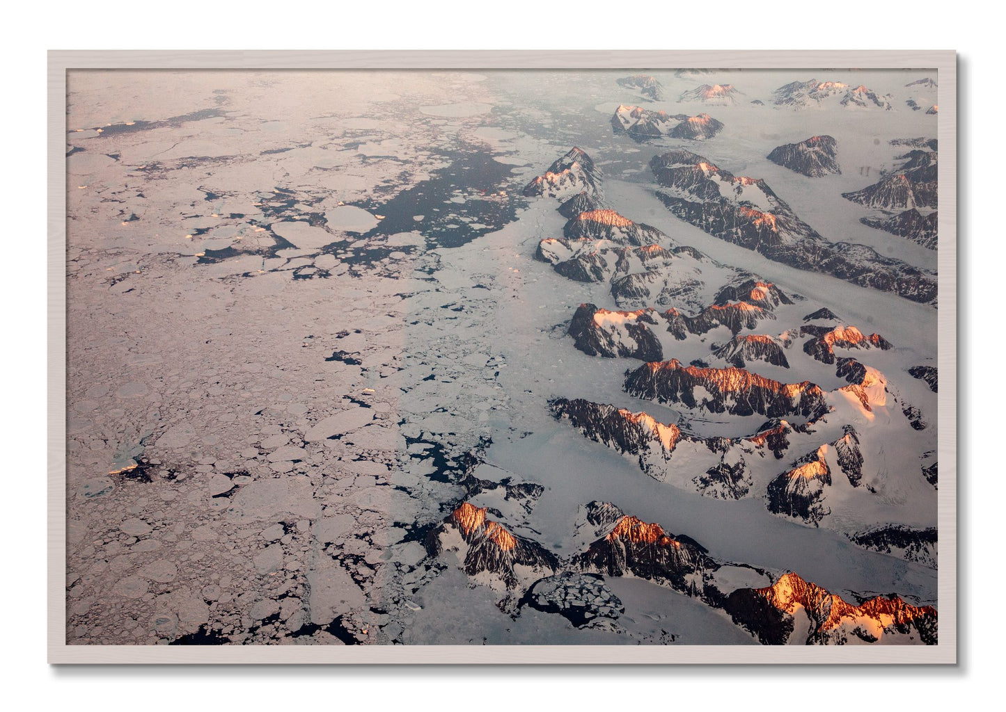 Framed photograph of Greenland Peaks by Dylan Ozanich, White Maple frame, Full Bleed