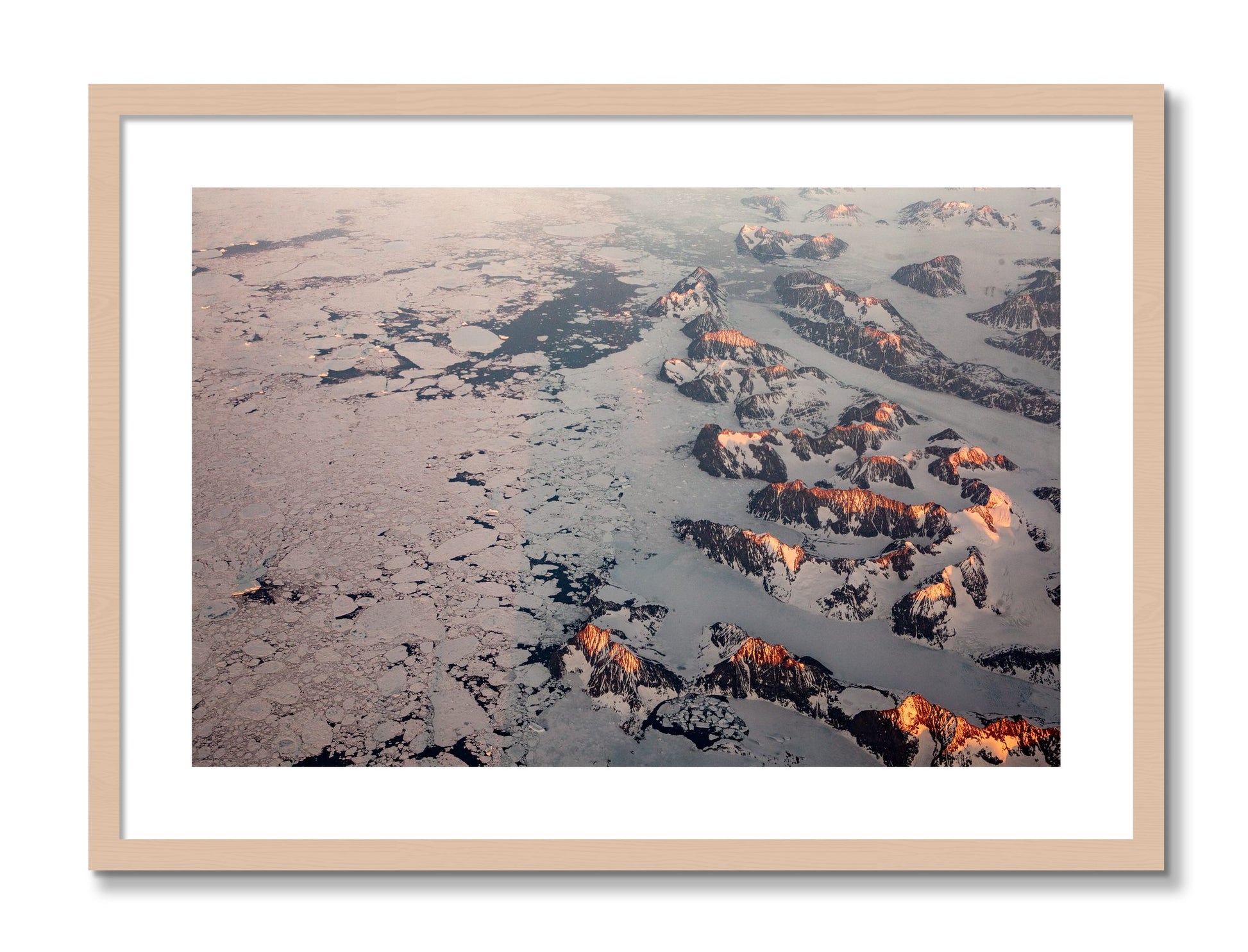 Framed photograph of Greenland Peaks by Dylan Ozanich, Maple frame, Borders