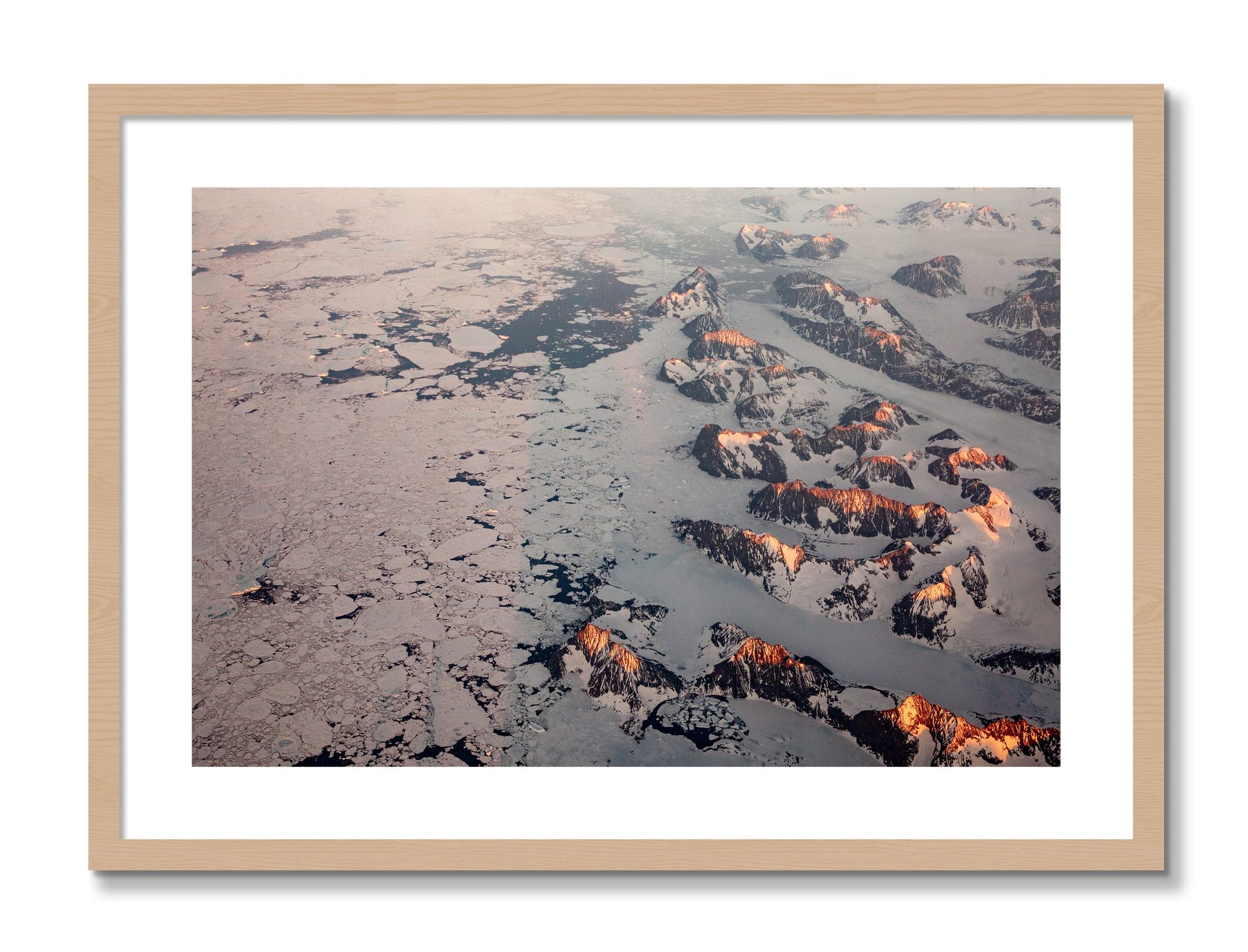 Framed photograph of Greenland Peaks by Dylan Ozanich, Oak frame, Borders