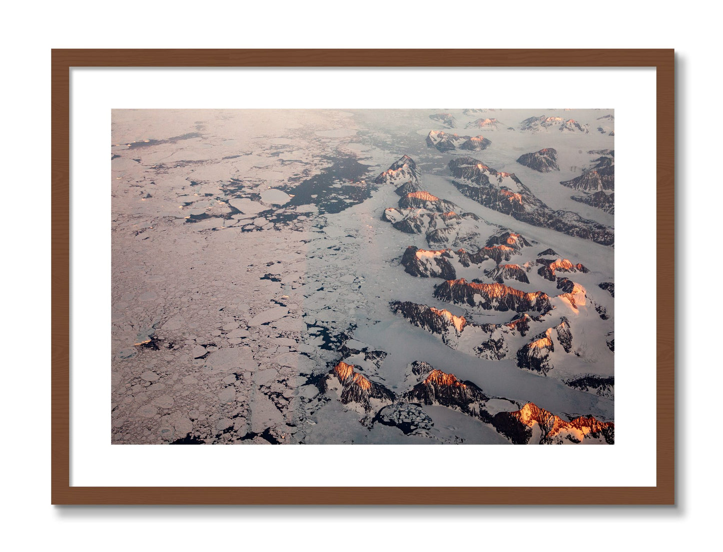 Framed photograph of Greenland Peaks by Dylan Ozanich, Walnut frame, Borders