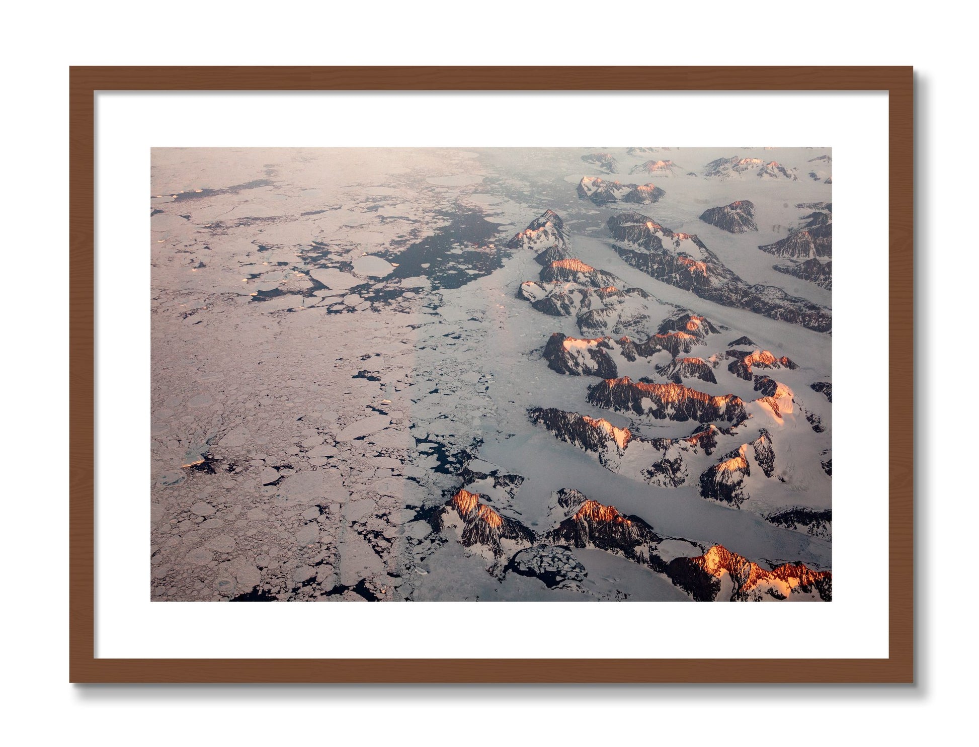 Framed photograph of Greenland Peaks by Dylan Ozanich, Walnut frame, Borders