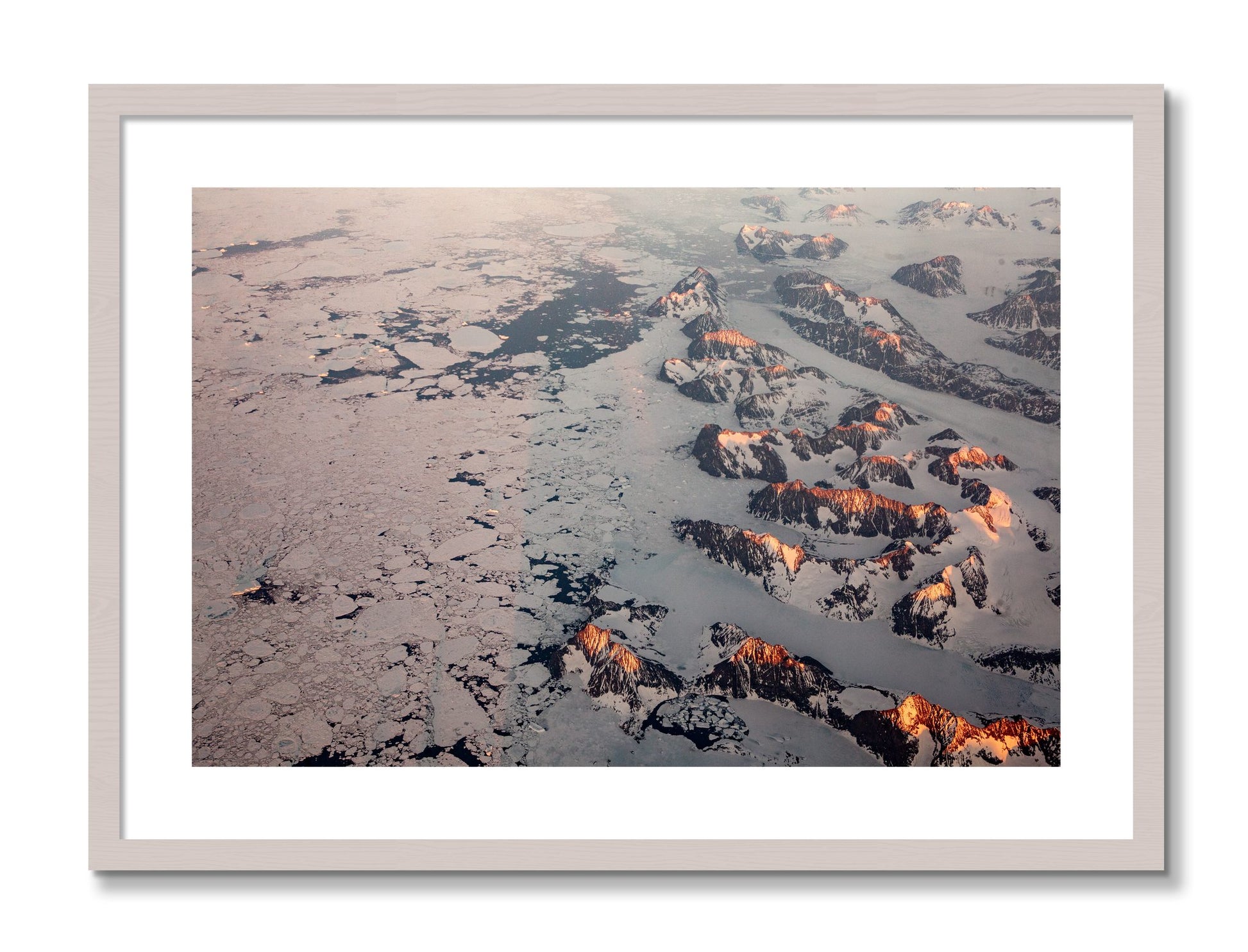 Framed photograph of Greenland Peaks by Dylan Ozanich, White Maple frame, Borders